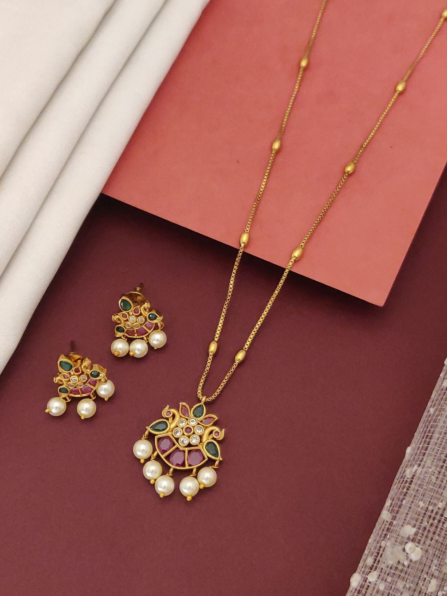 Simple Gold Plated Pachi Kundan Peacock Necklace Set with matching earrings pearls and green stones