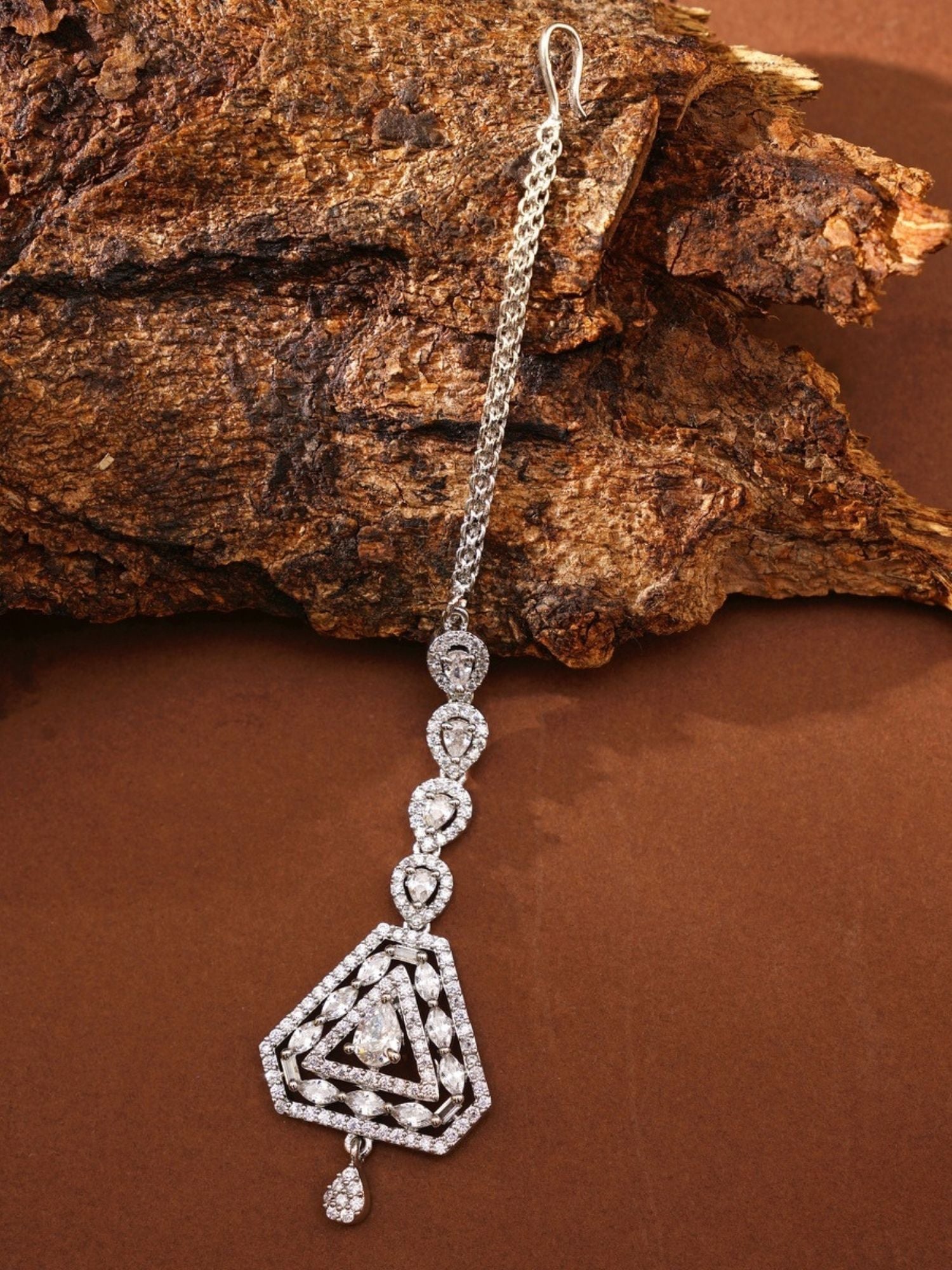 Solitaire diamond maangtikka by Abdesignsjewellery featuring geometric triangular pendant and chain