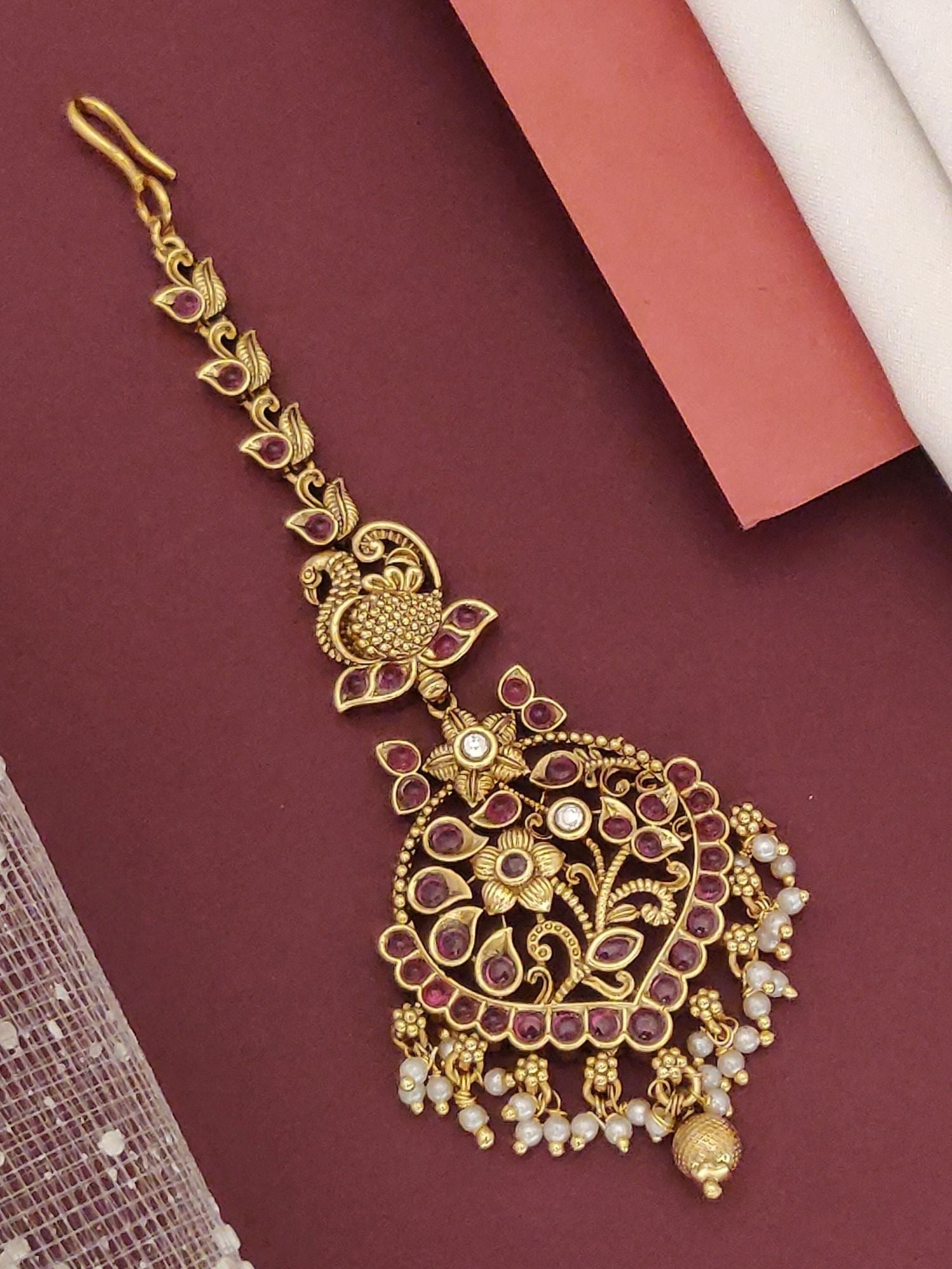 South Indian gold plated maangtikka Abdesignsjewellery peacock motif with ruby stones and pearl dangles