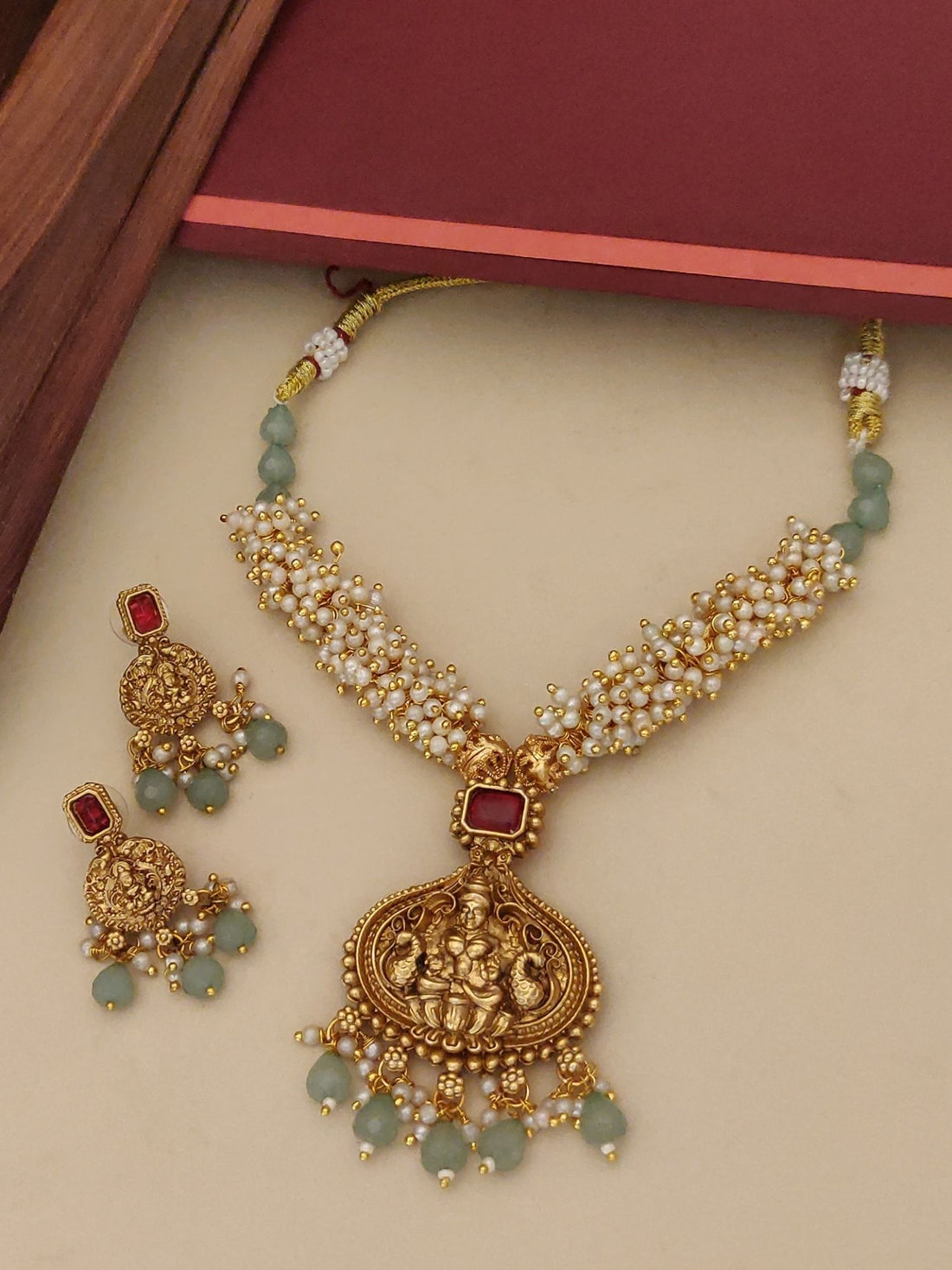 Abdesignsjewellery South Indian Gold Plated Temple Necklace Set with pearl clusters green beads and matching earrings