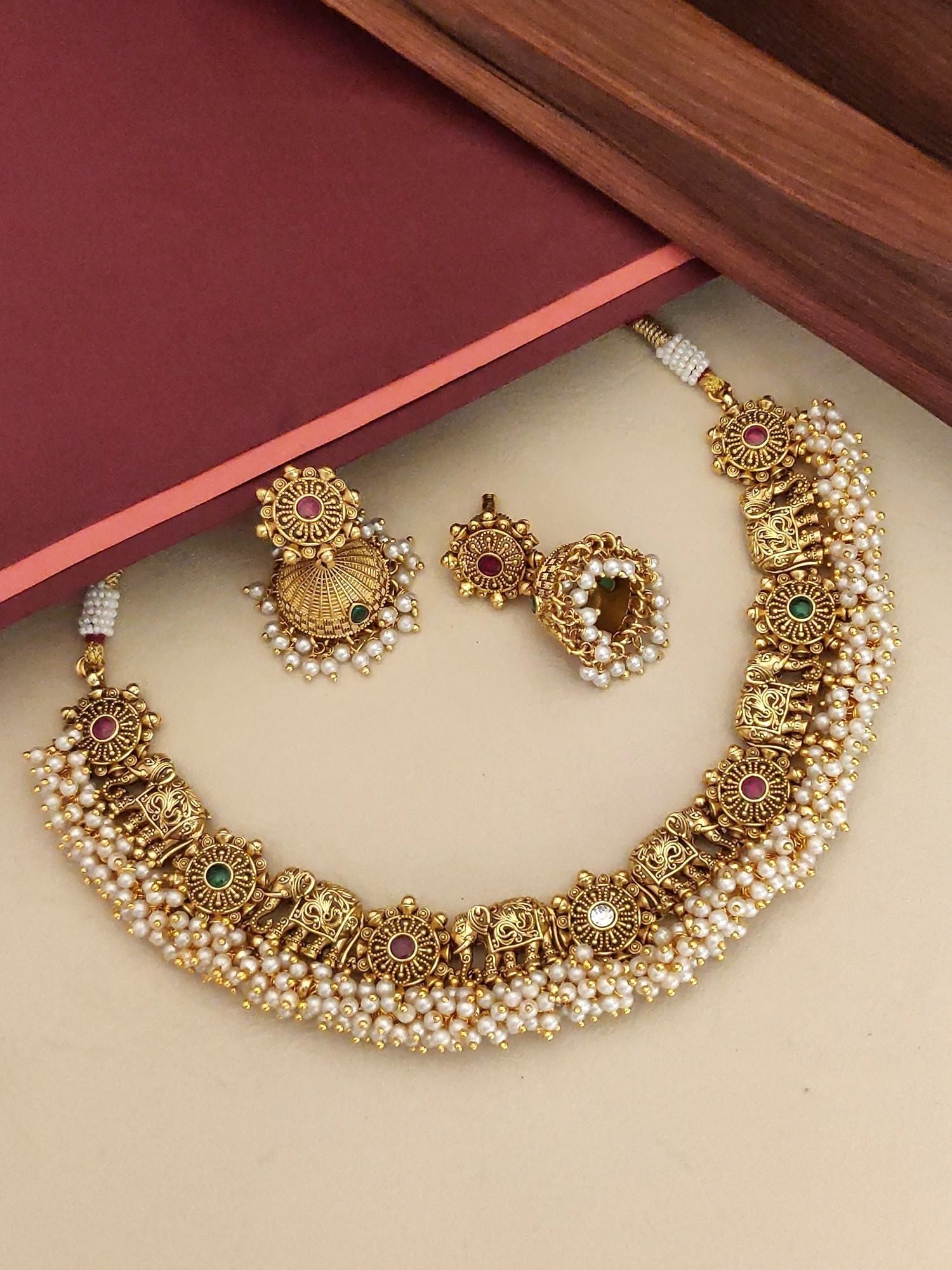 Southindian Antique Elephant Necklace Set by Abdesignsjewellery gold temple necklace with pearl fringe and matching earrings
