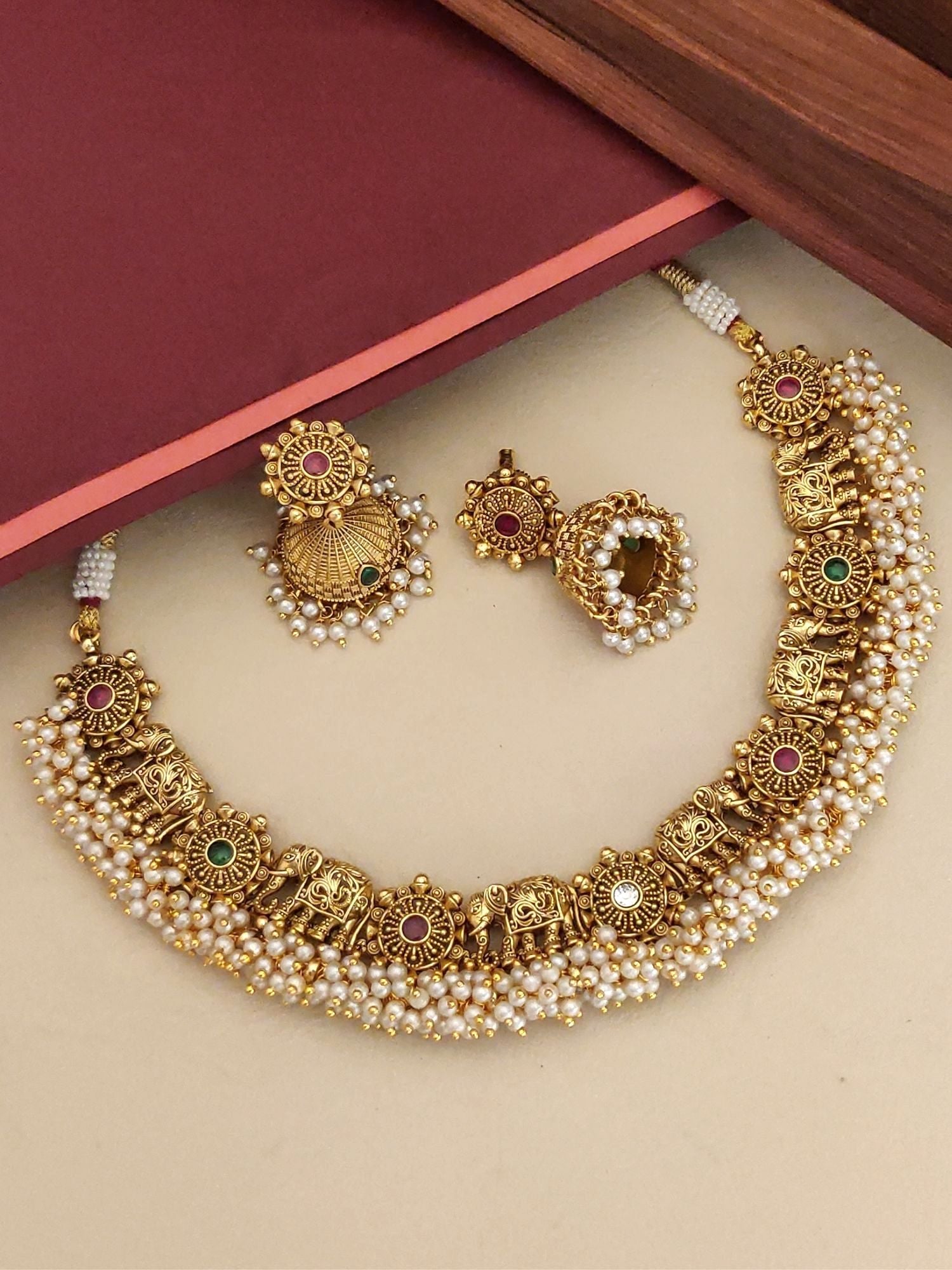 Southindian Antique Elephant Necklace Set by Abdesignsjewellery gold tone temple jewelry with pearls and matching earrings