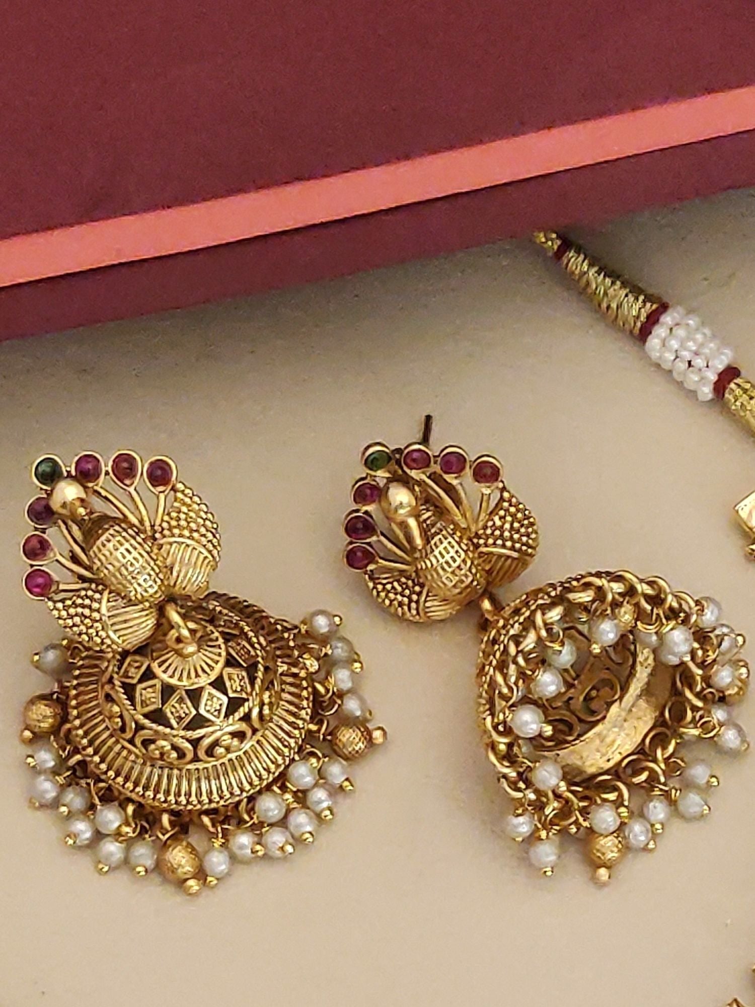 Southindian Antique Peacock Necklace Set by Abdesigns Jewellery. gold peacock pendant with pearl fringe