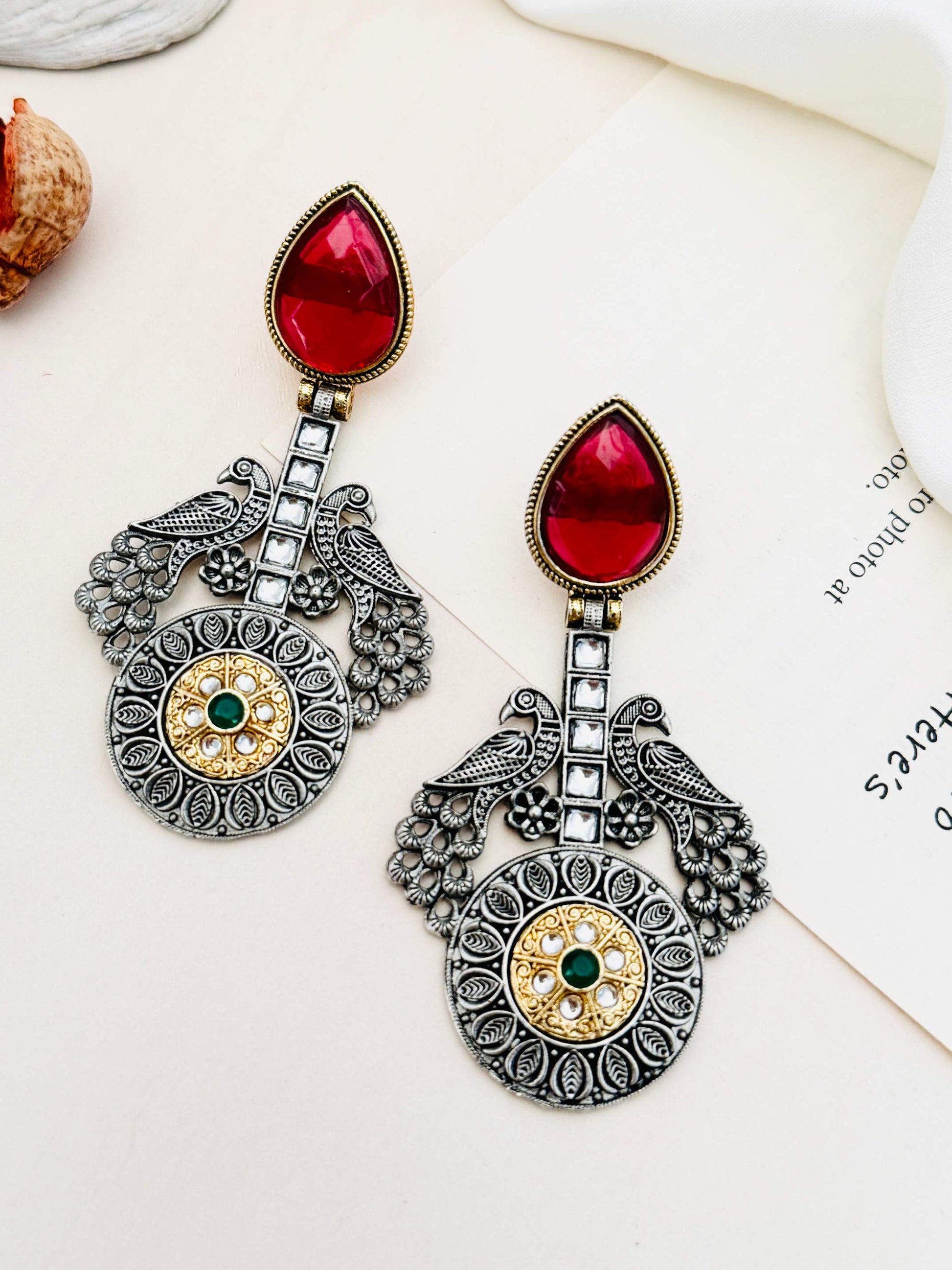 Statement German Antique Silver Plated Peacock Earring with red teardrop gem and intricate peacock design