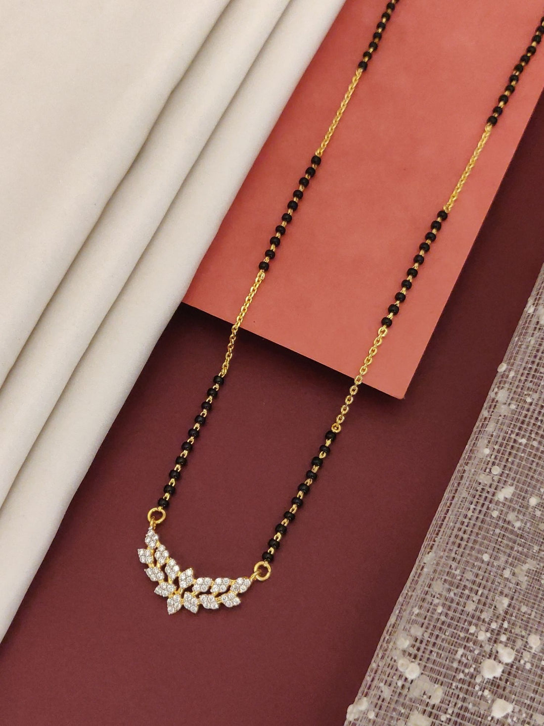 Elegant mangalsutra featuring a 925 sterling silver jewelry pendant adorned with sparkling stones