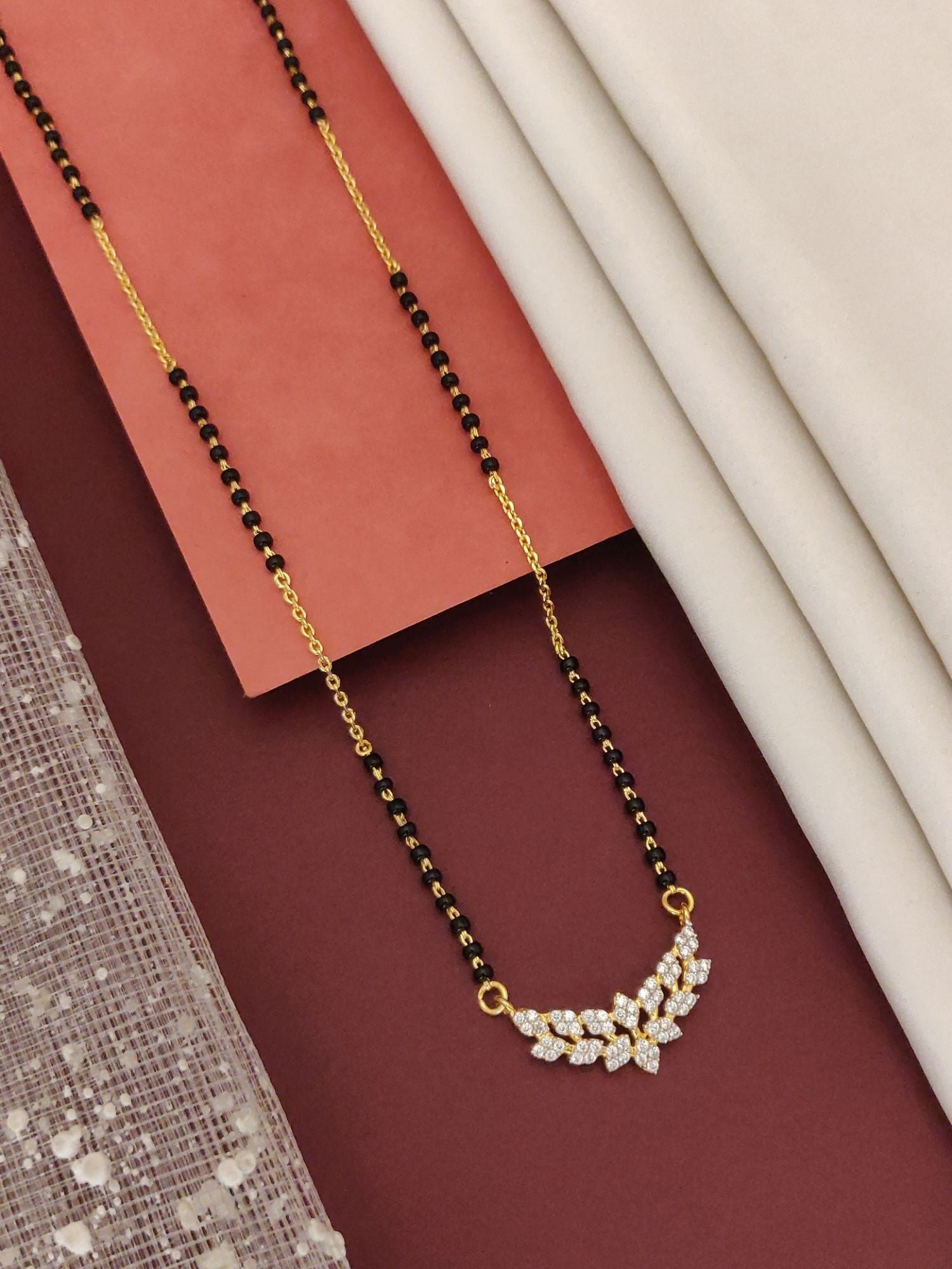 Elegant Abdesignsjewellery Mangalsutra in sterling 925 silver jewelry with sparkling stone accents.