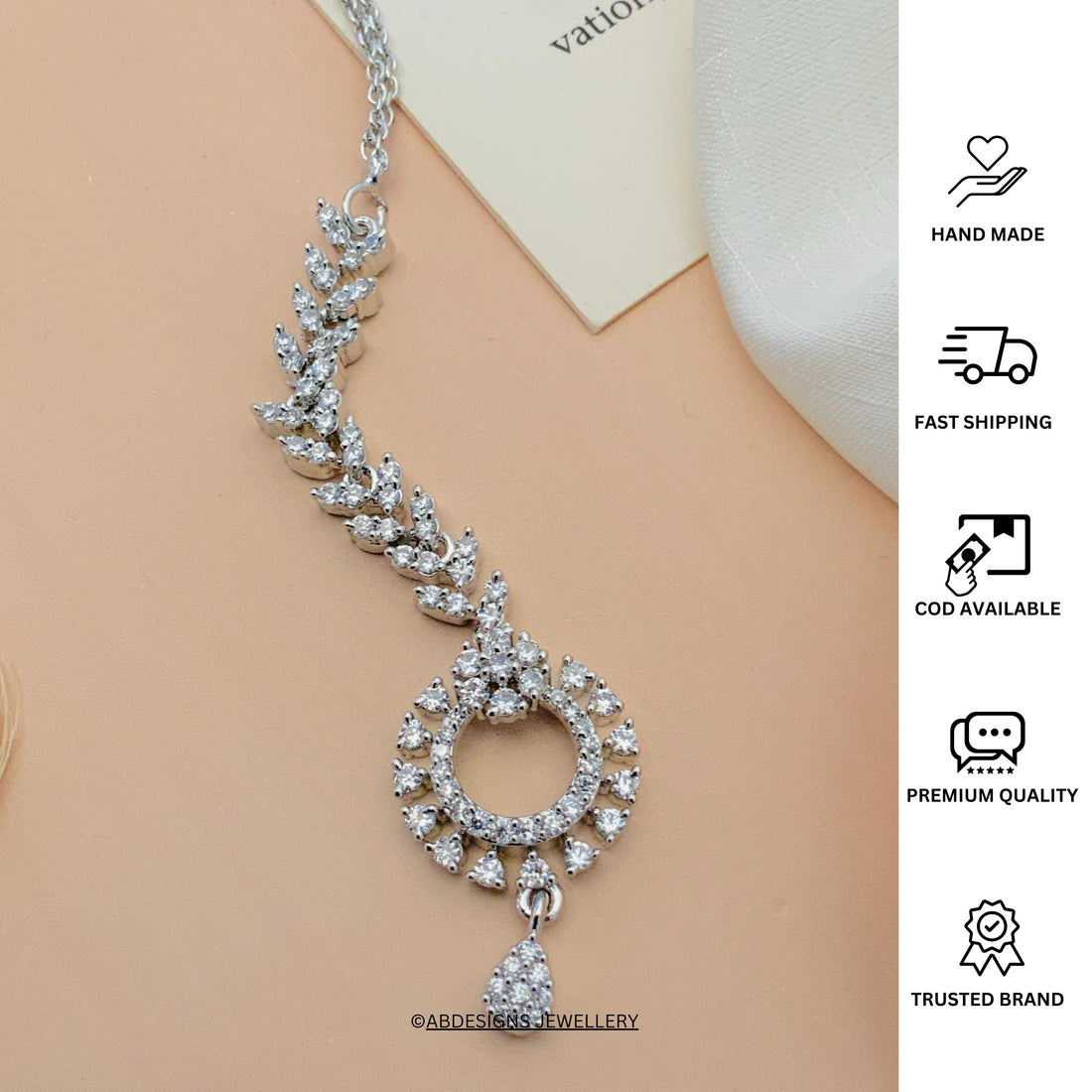 Timeless Silver Plated American Diamond Maangtikka with intricate design and sparkling stones by Abdesignsjewellery