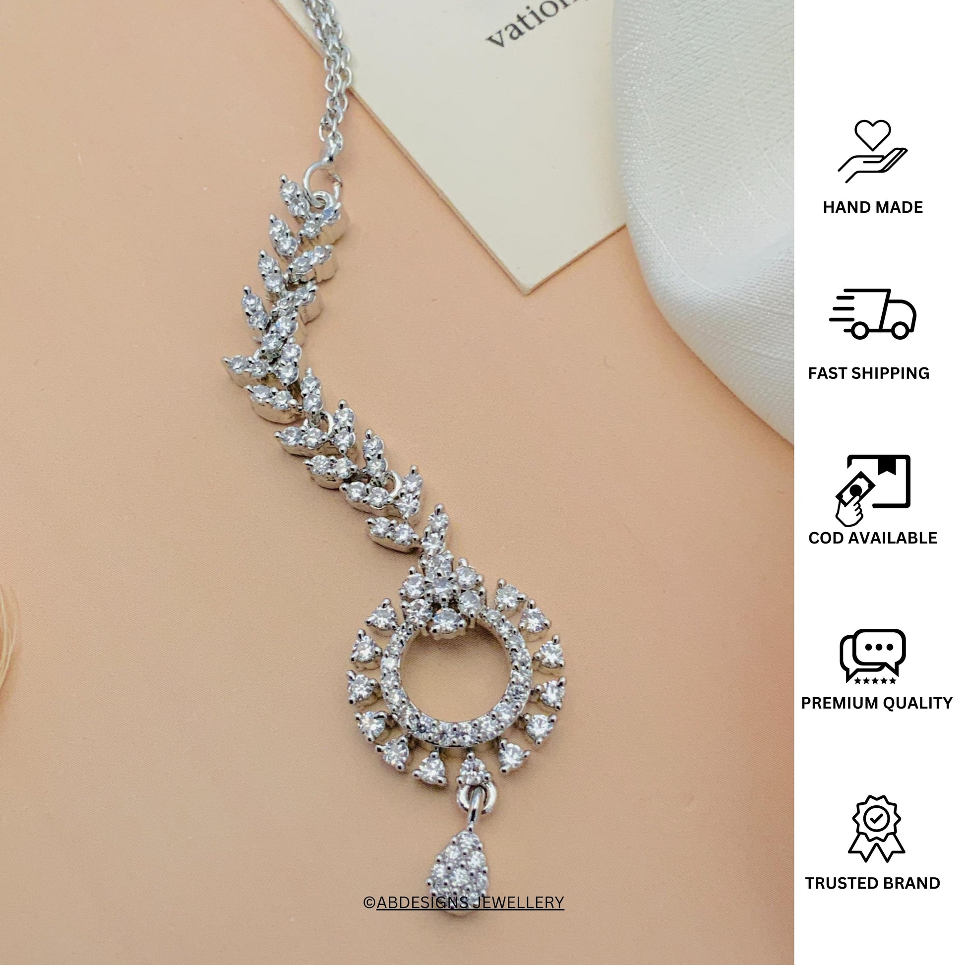 Timeless Silver Plated American Diamond Maangtikka with intricate design by Abdesignsjewellery