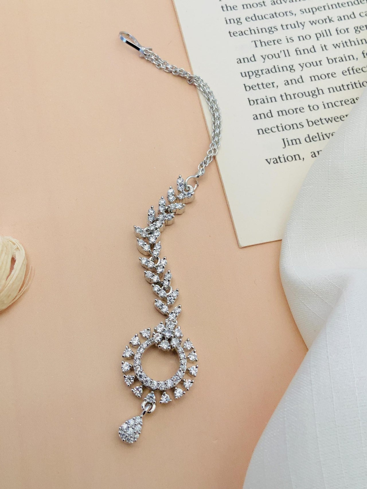 Timeless Silver Plated American Diamond Maangtikka with intricate floral design and adjustable chain