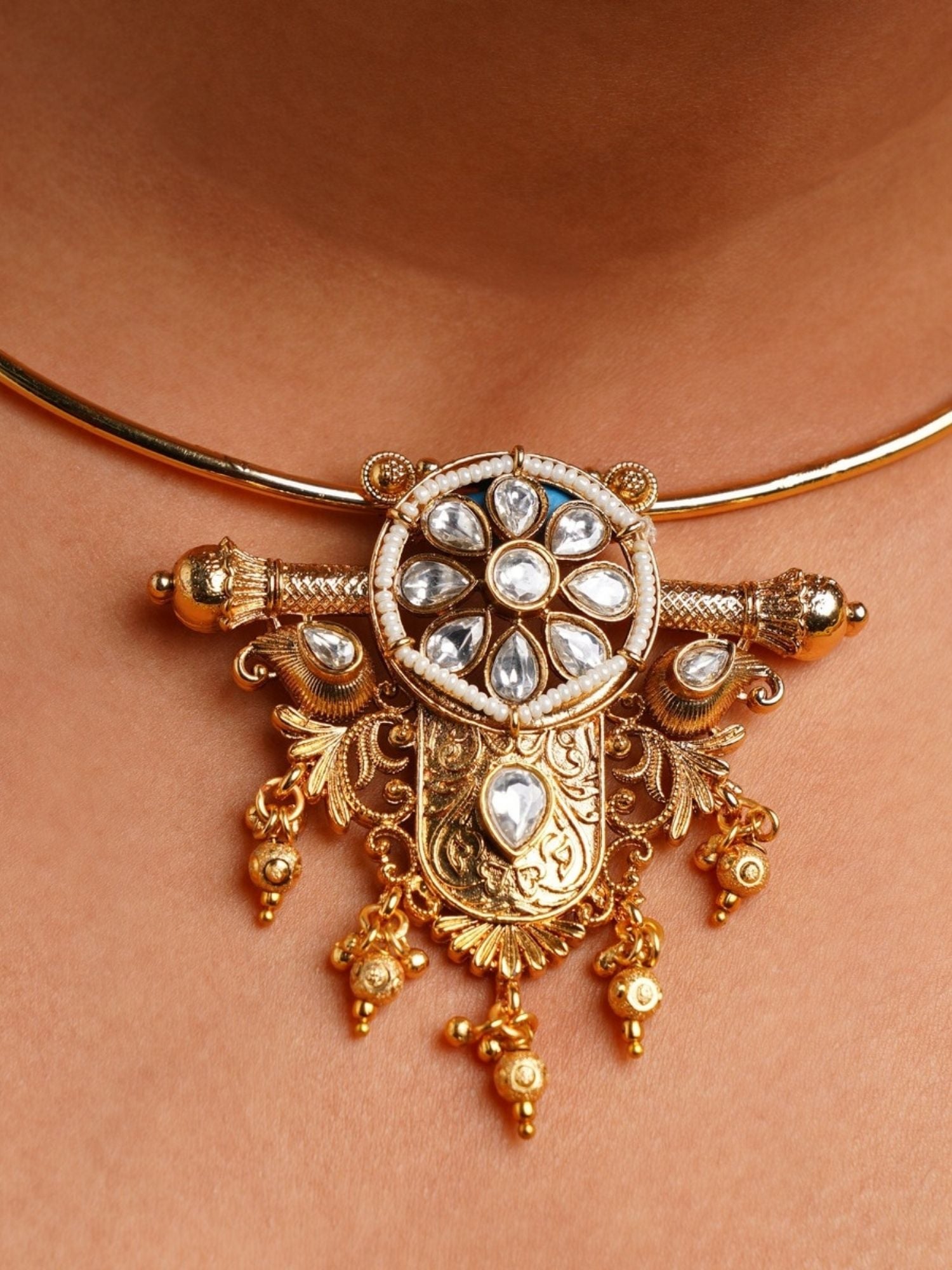 Abdesignsjewellery traditional Indian gold choker necklace with ornate Kundan pendant and dangling gold beads on model
