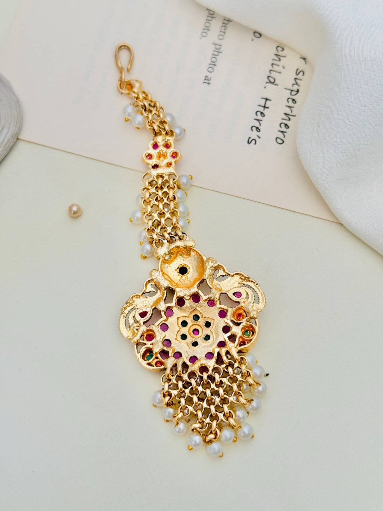 Traditional Matt Gold Plated SouthIndian Maangtikka with intricate design and hanging pearl beads by Abdesignsjewellery