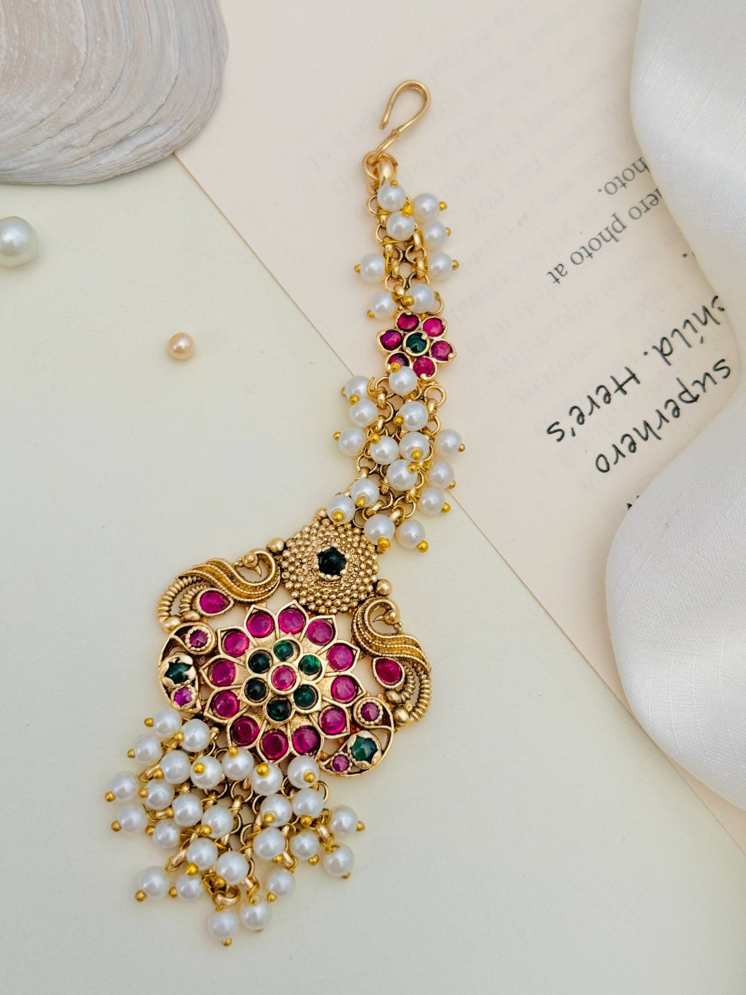 Traditional Matt Gold Plated SouthIndian Maangtikka with white pearls and red and green stones by Abdesignsjewellery
