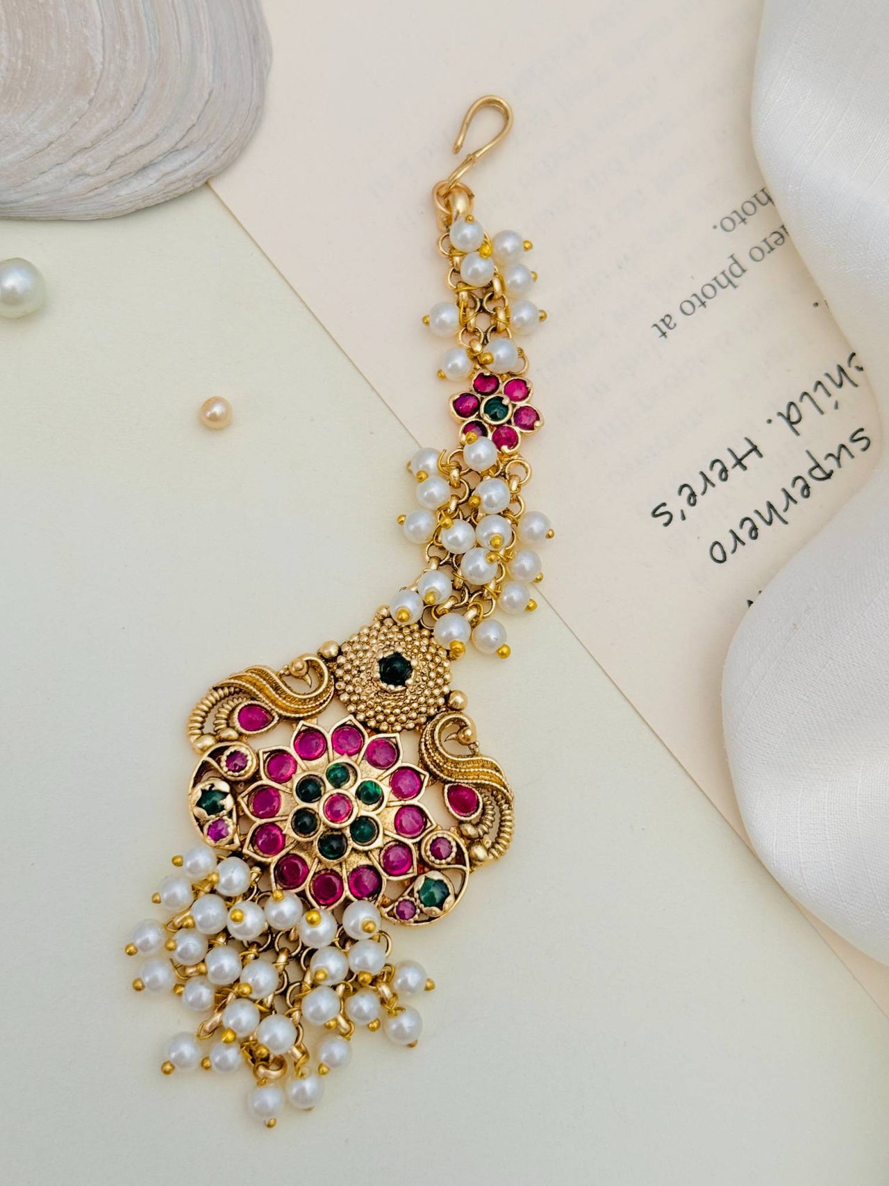 Traditional Matt Gold Plated SouthIndian Maangtikka with white pearls and red and green stones by Abdesignsjewellery