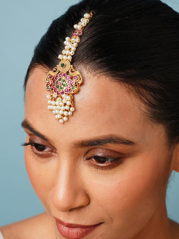 Traditional Matt Gold Plated SouthIndian Maangtikka with pearls and colored stones worn on forehead