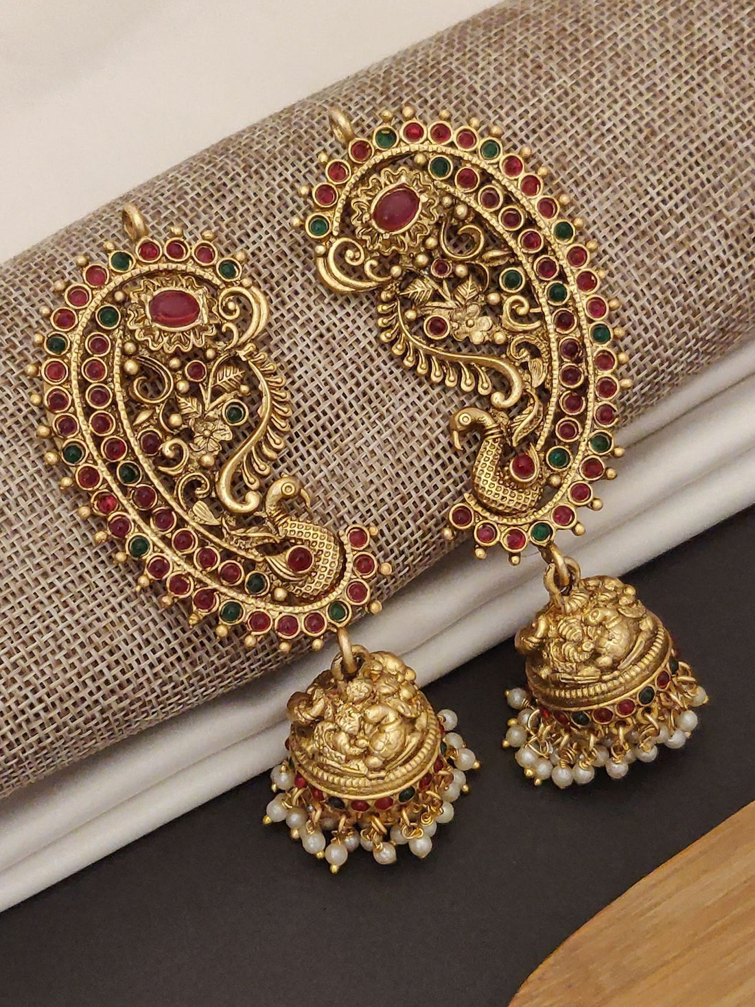 Traditional South Indian Style Gold Plated Ear Cuffs with intricate red and green stone detailing and pearl tassels