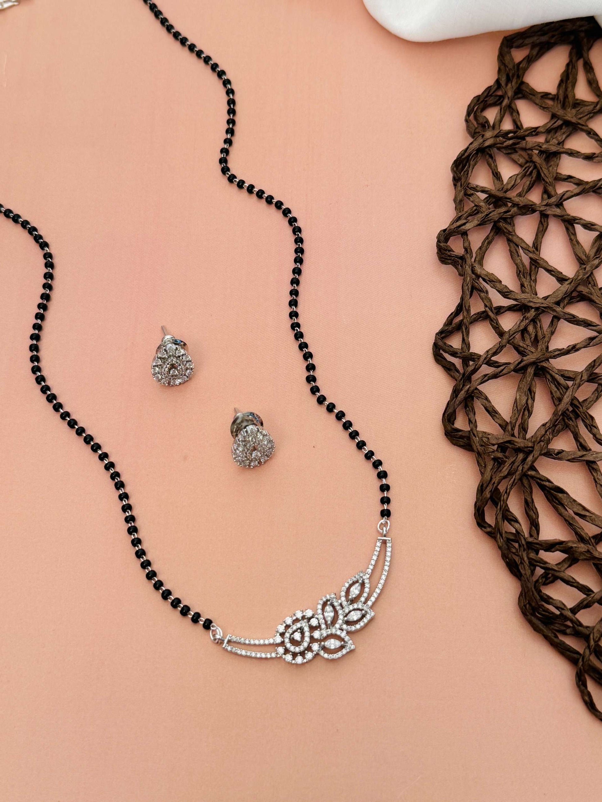 American Diamond Flower Mangalsutra Set with black beads and matching stud earrings by Abdesignsjewellery