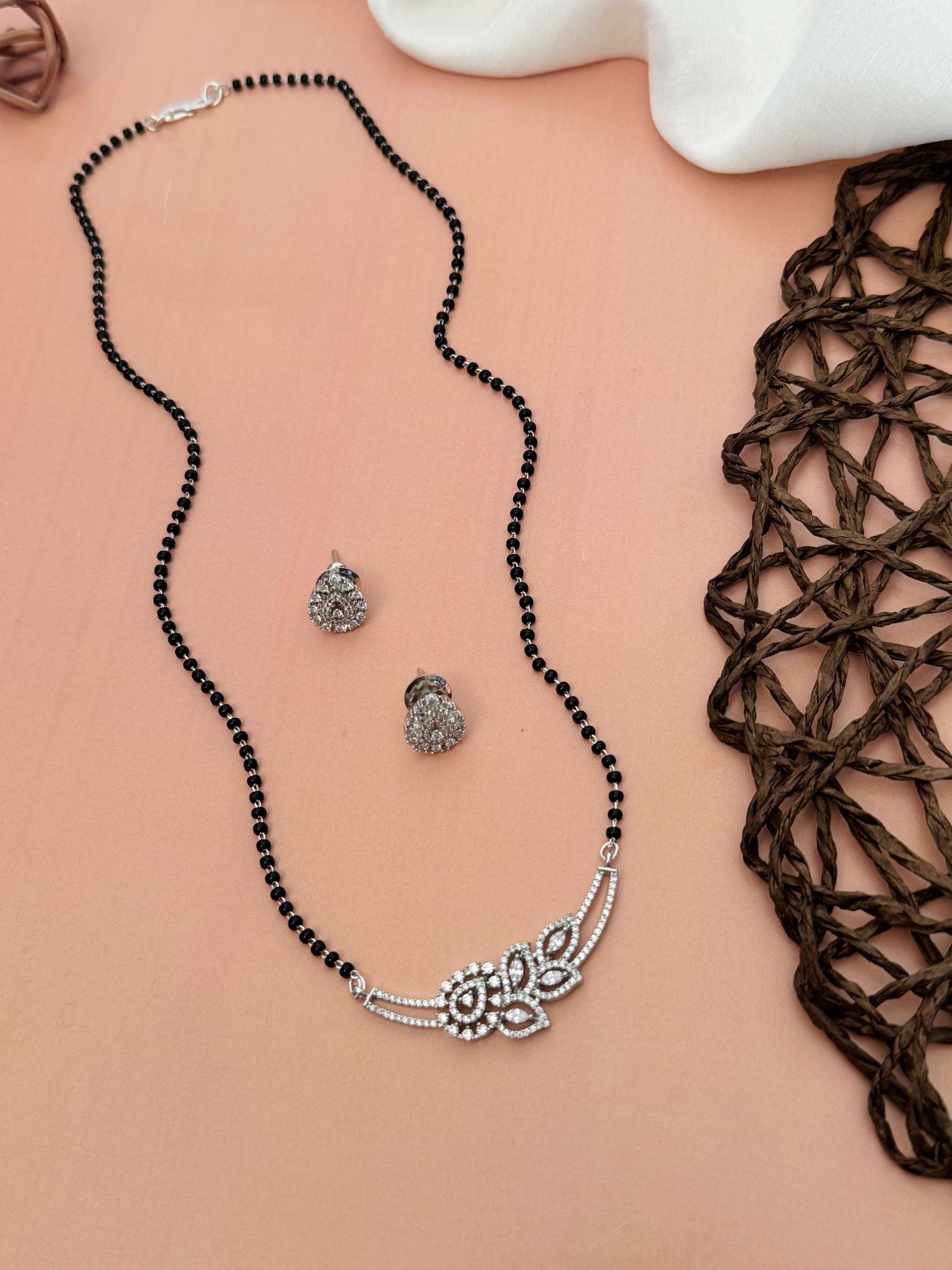 Abdesignsjewellery American Diamond Flower Mangalsutra Set with black beads and floral diamond pendant