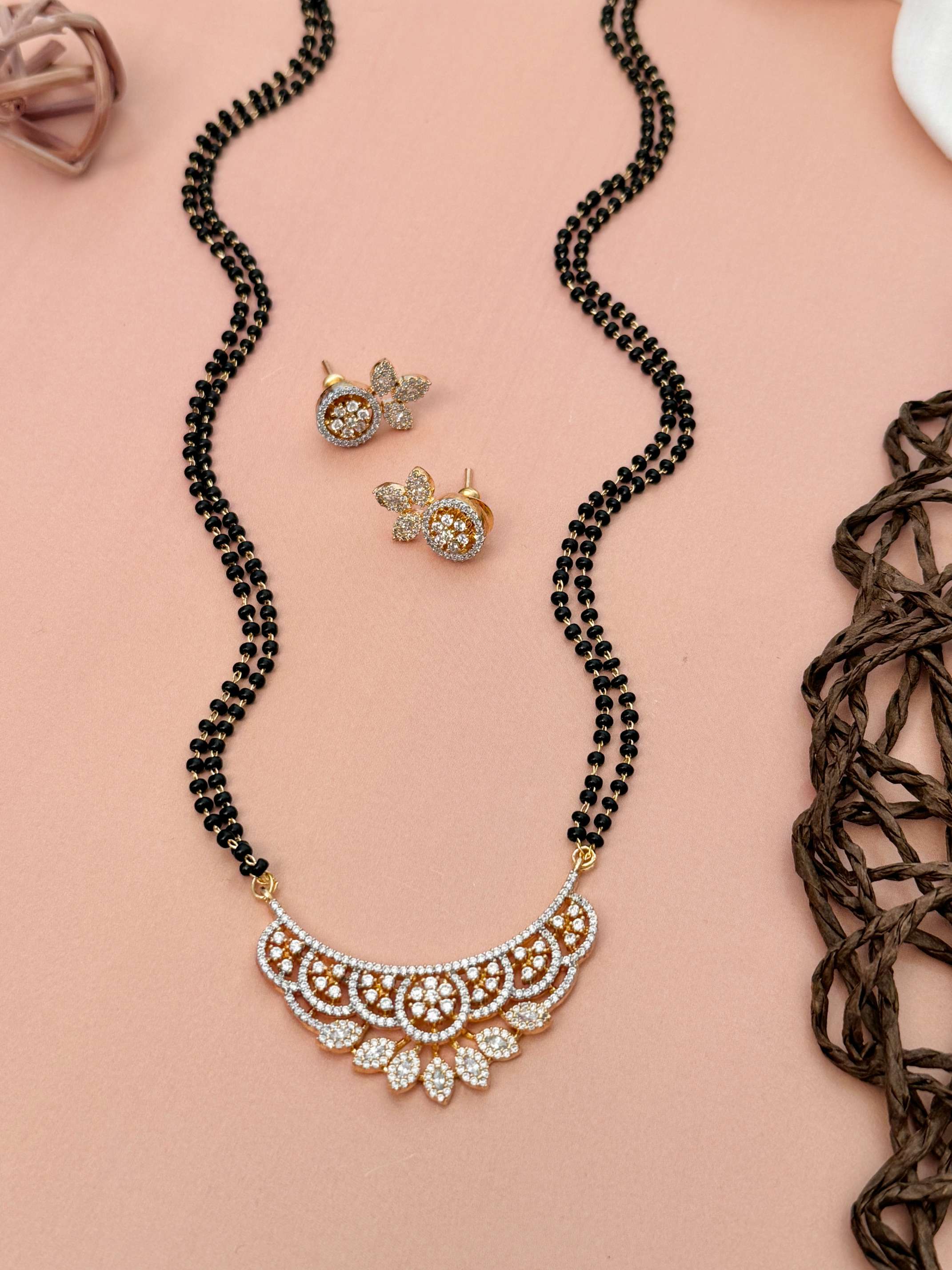 Abdesignsjewellery American Diamond Mangalsutra Set with intricate pendant and matching earrings