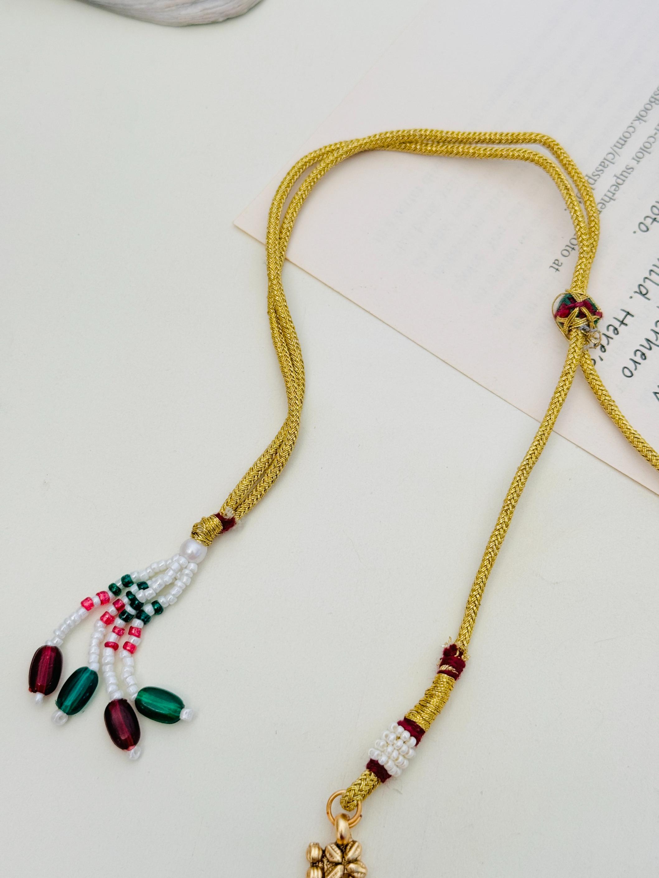 Antique Golden Plated Matt Finish Necklace Set with intricate bead and tassel detailing by Abdesignsjewellery