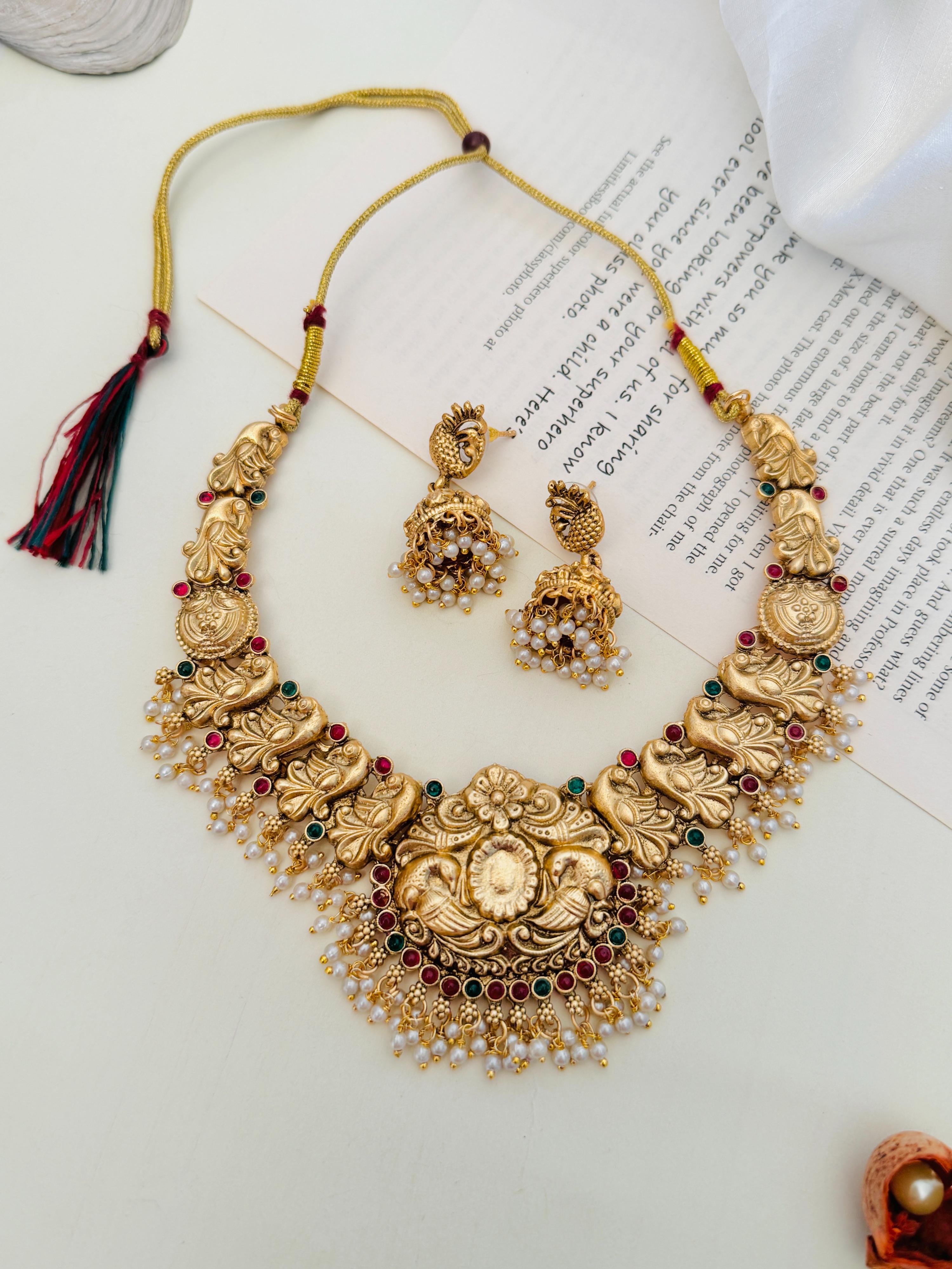 Antique Golden Plated Matt Finish Necklace Set by Abdesignsjewellery with intricate floral design and matching earrings