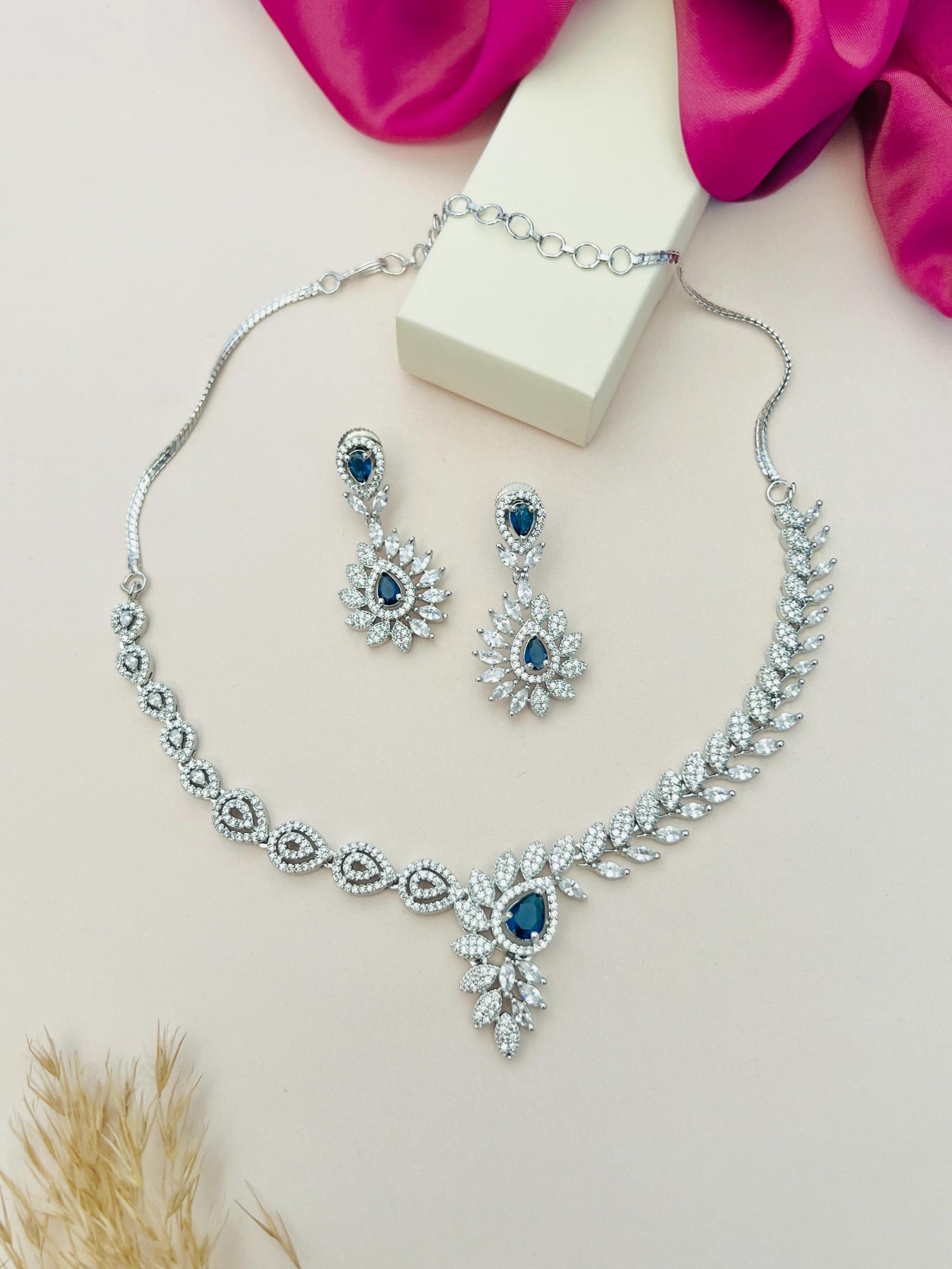 Artistic Silver Plated American Diamond Necklace with matching blue stone earrings by Abdesignsjewellery