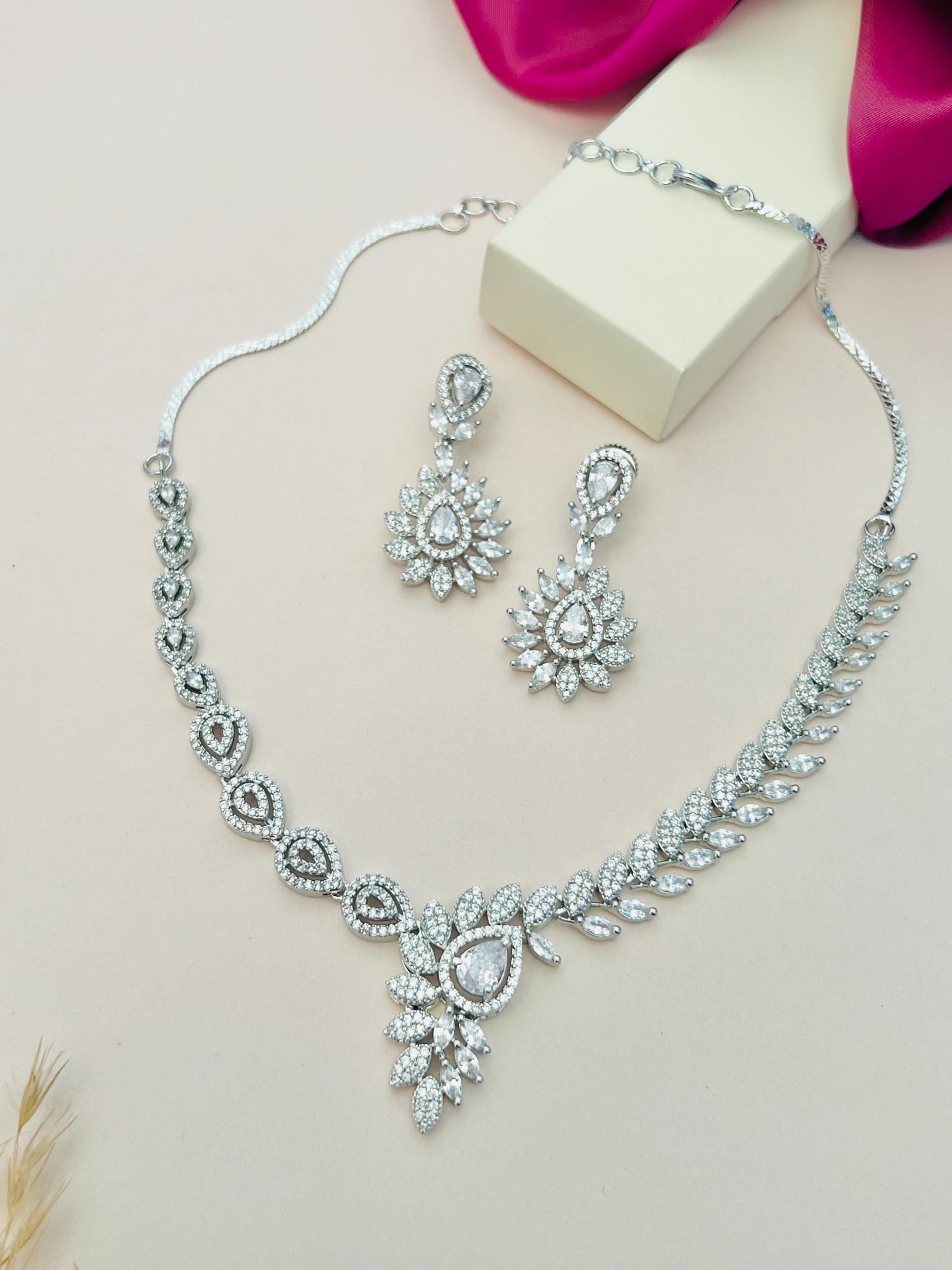 Artistic Silver Plated American Diamond Necklace with matching earrings by Abdesignsjewellery