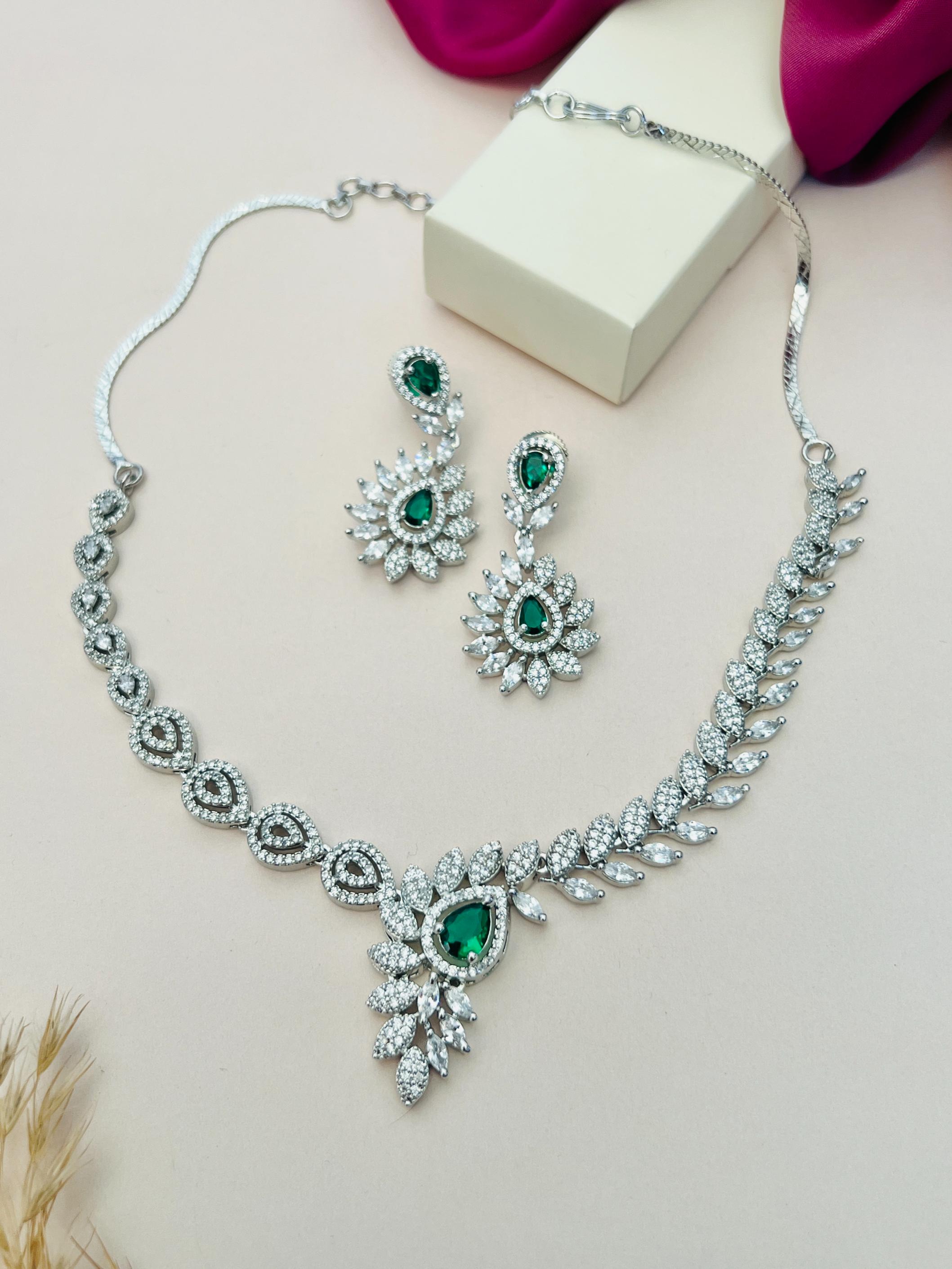 Artistic Silver Plated American Diamond Necklace with matching green stone earrings by Abdesignsjewellery
