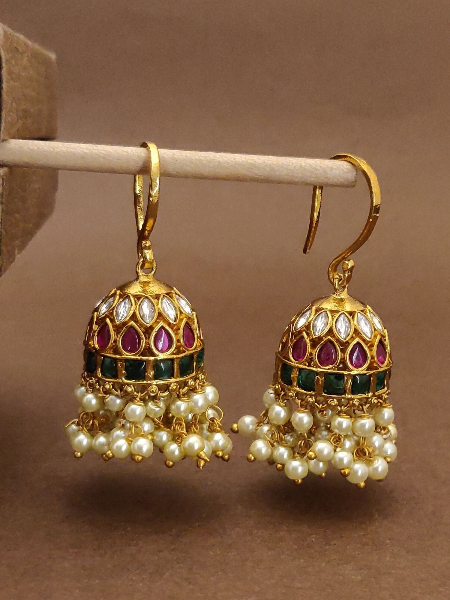 Elegant gold finish kempstone hoop earrings with pearl and red green stone detailing by Abdesignsjewellery