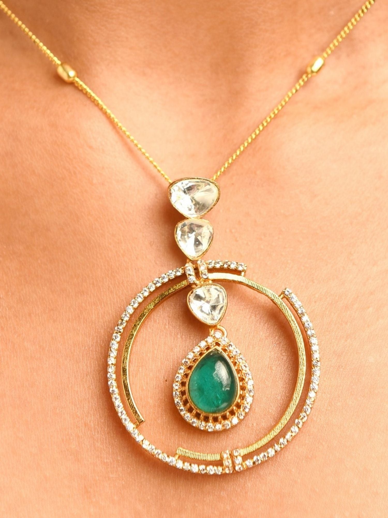 Celebrity Style Gold Plated Polki Pendant Chain with green gemstone and clear stones on gold necklace