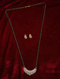 Thumbnail for Classic Long Gold Plated American Diamond Mangalsutra Set with intricate pendant and matching earrings on red velvet
