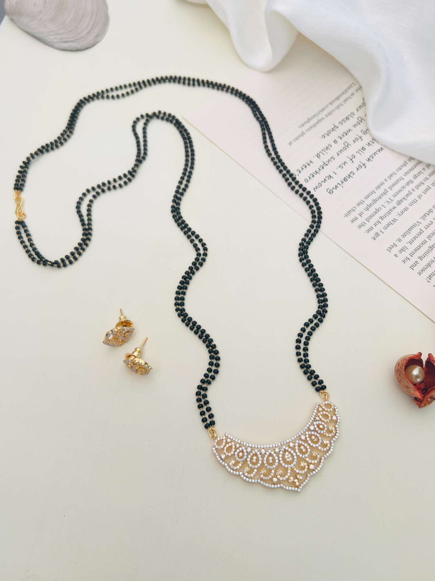 Classic Long Gold Plated American Diamond Mangalsutra Set with black beads and matching earrings from Abdesignsjewellery