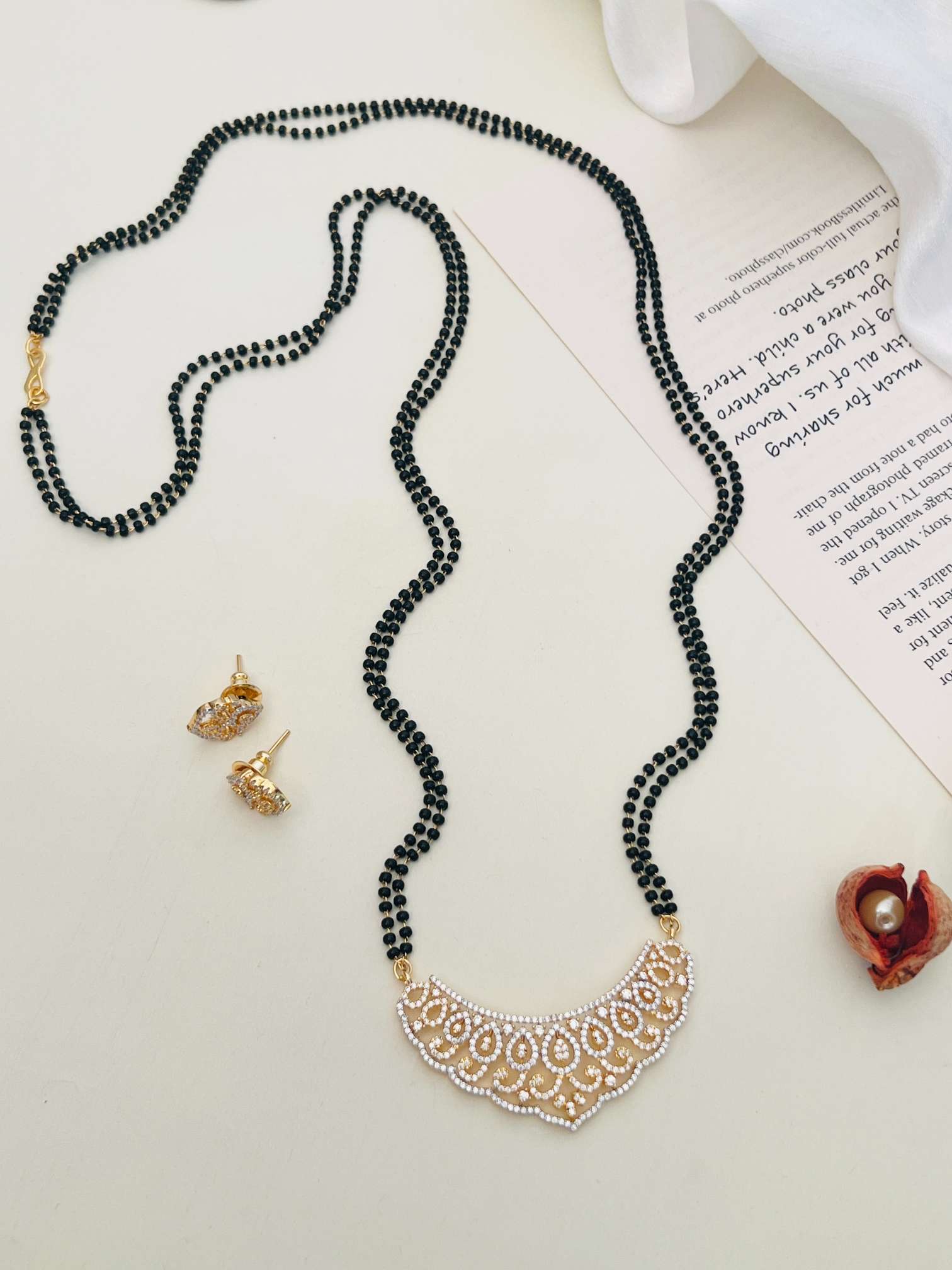 Classic Long Gold Plated American Diamond Mangalsutra Set by Abdesignsjewellery with intricate pendant and matching earrings