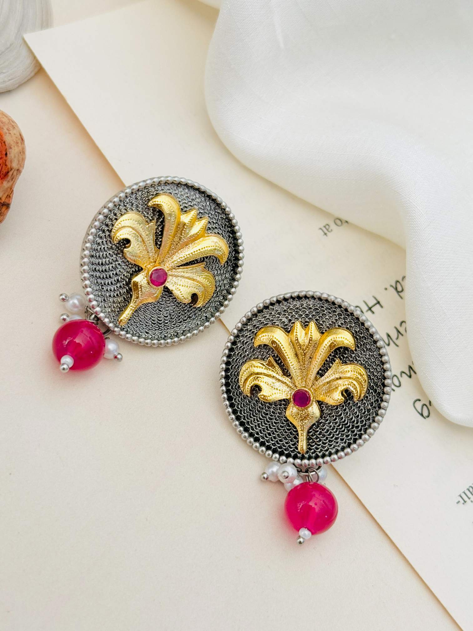 Abdesignsjewellery Dual Plating Oxidised Round Stud Earring with gold floral design and pink bead drop