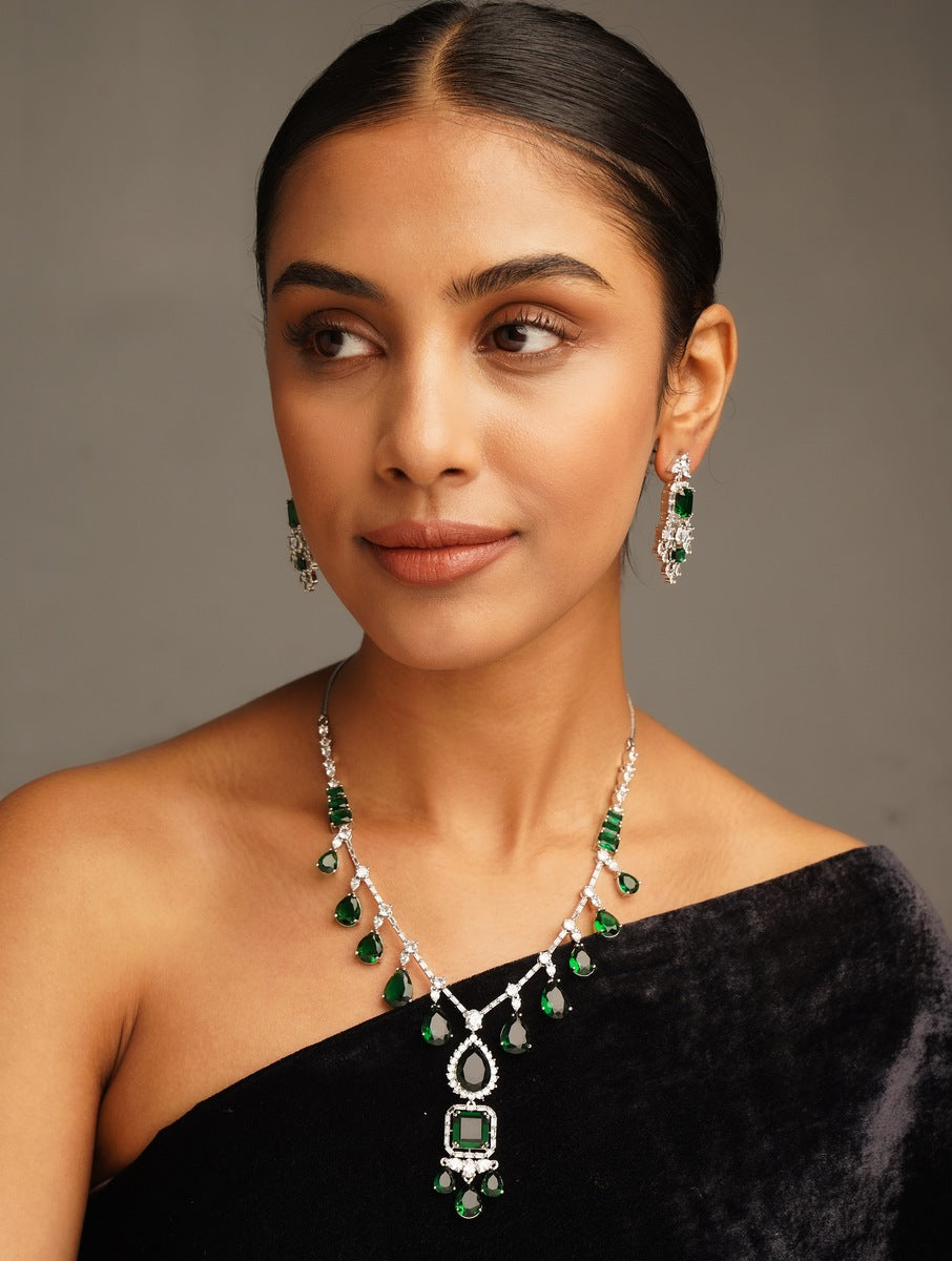 Emerald American Diamond Necklace Set by Abdesignsjewellery worn by woman with matching earrings