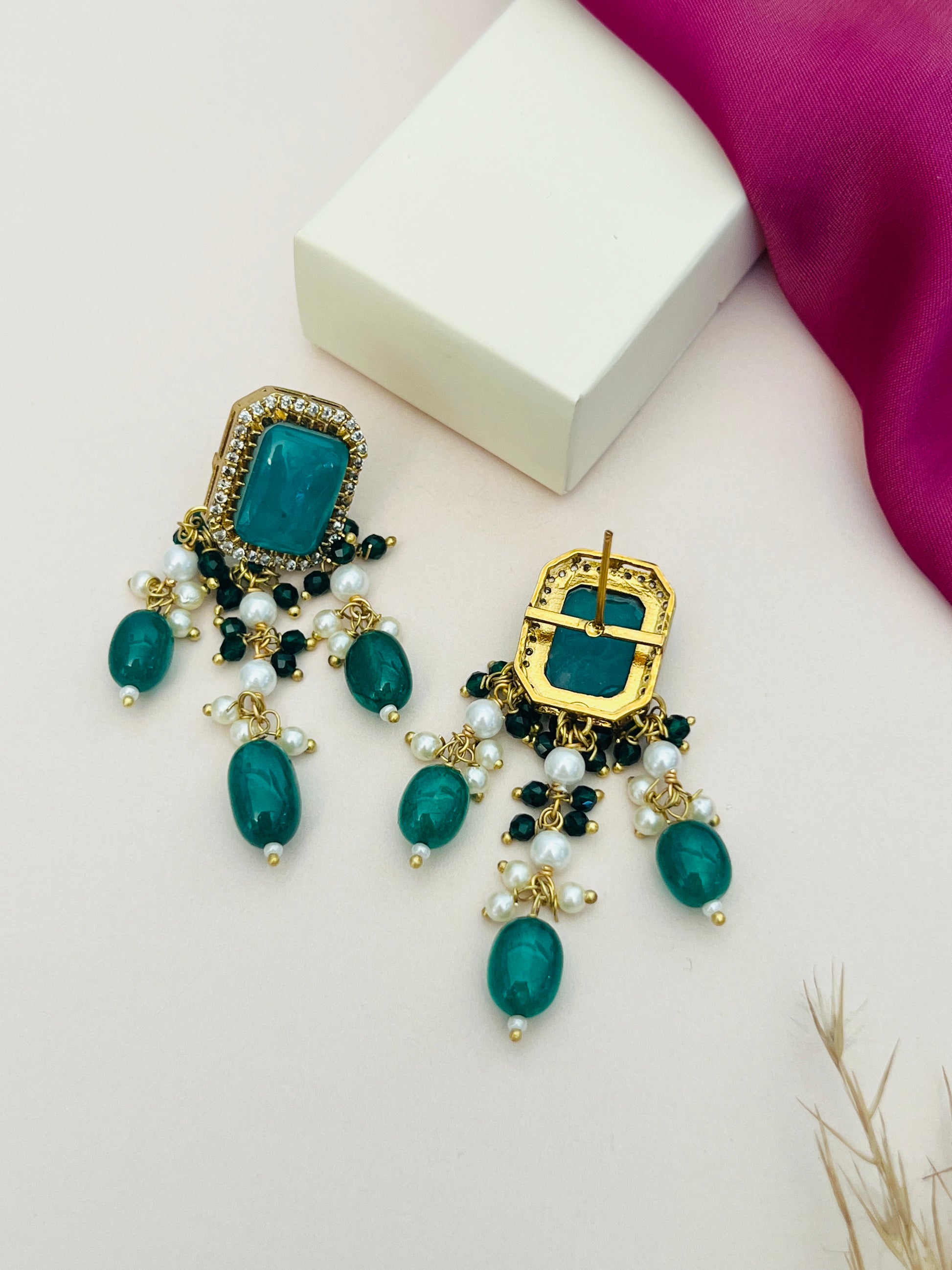 Emerald Green Stones Bridal Necklace Set earrings with gold detailing and pearl accents by Abdesignsjewellery