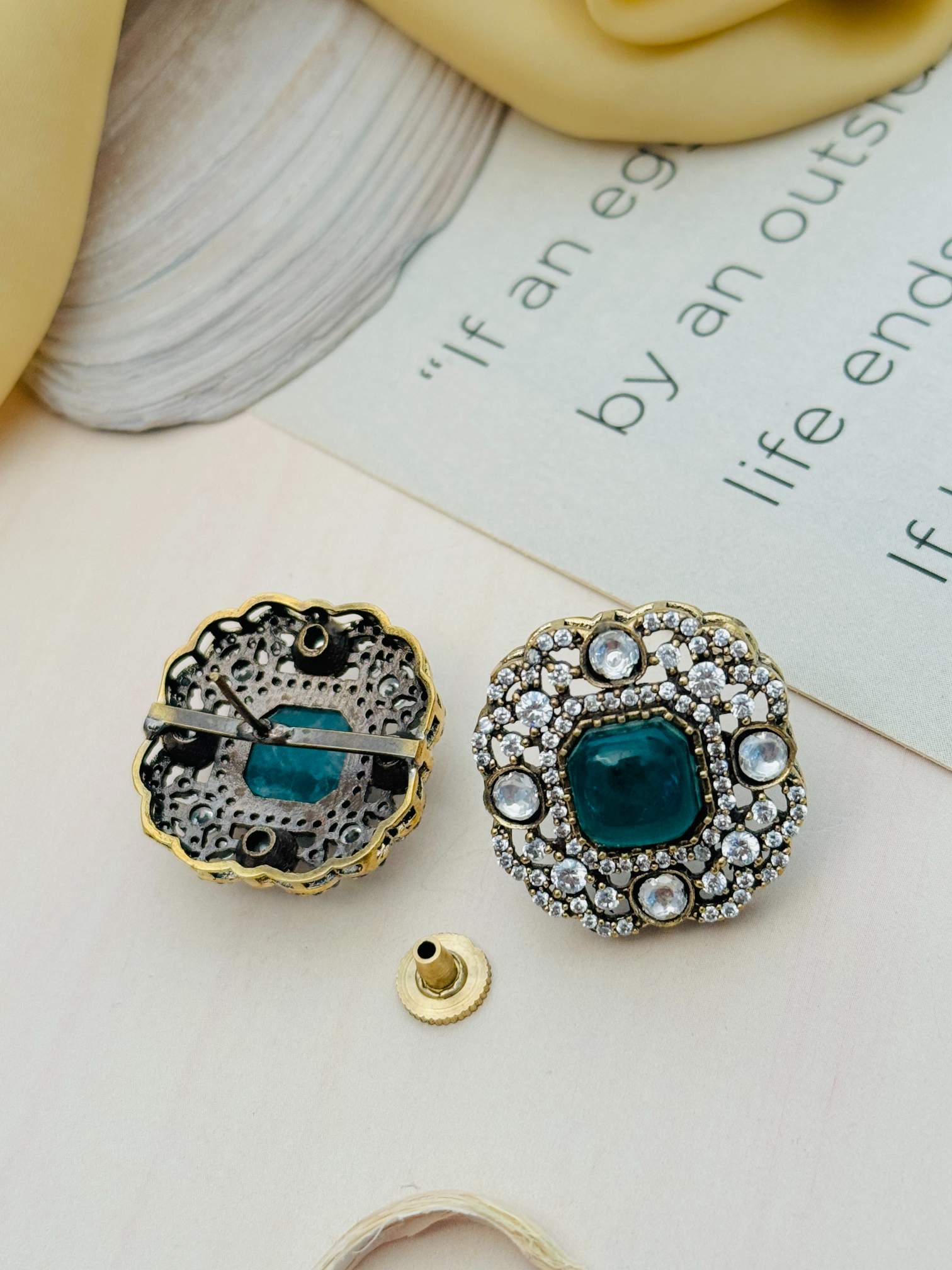 Abdesignsjewellery Emerald Polki Diamond Stud Earring with green center stone and intricate diamond detailing