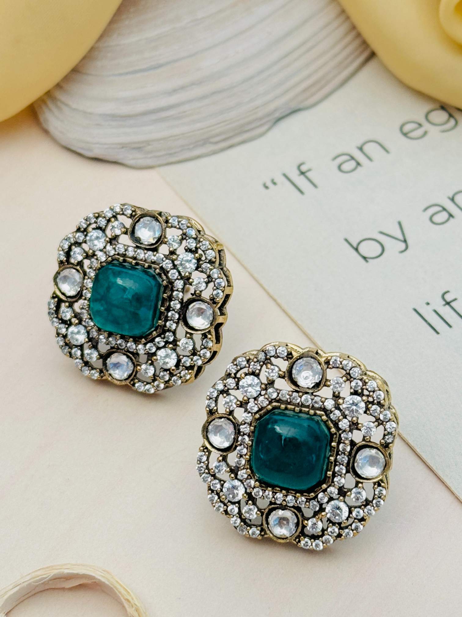 Abdesignsjewellery Emerald Polki Diamond Stud Earring with square emerald center and surrounding white diamonds