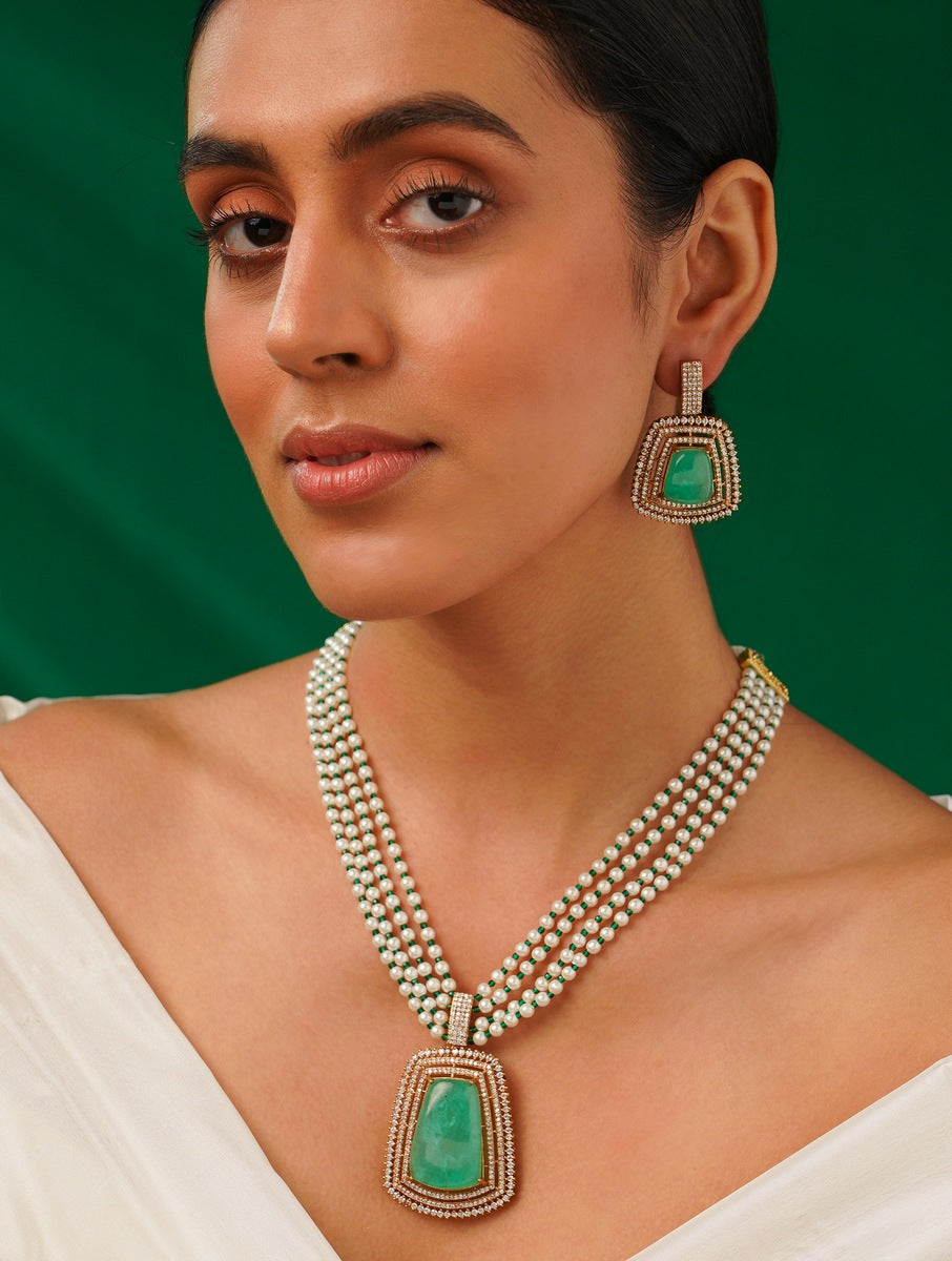 Emerald Stone Sabyasachi Necklace Set by Abdesignsjewellery with green stones and pearl detailing