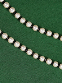 Thumbnail for Ethnic Gold Plated Pearls Foot Anklets with white pearls and black beads on green background