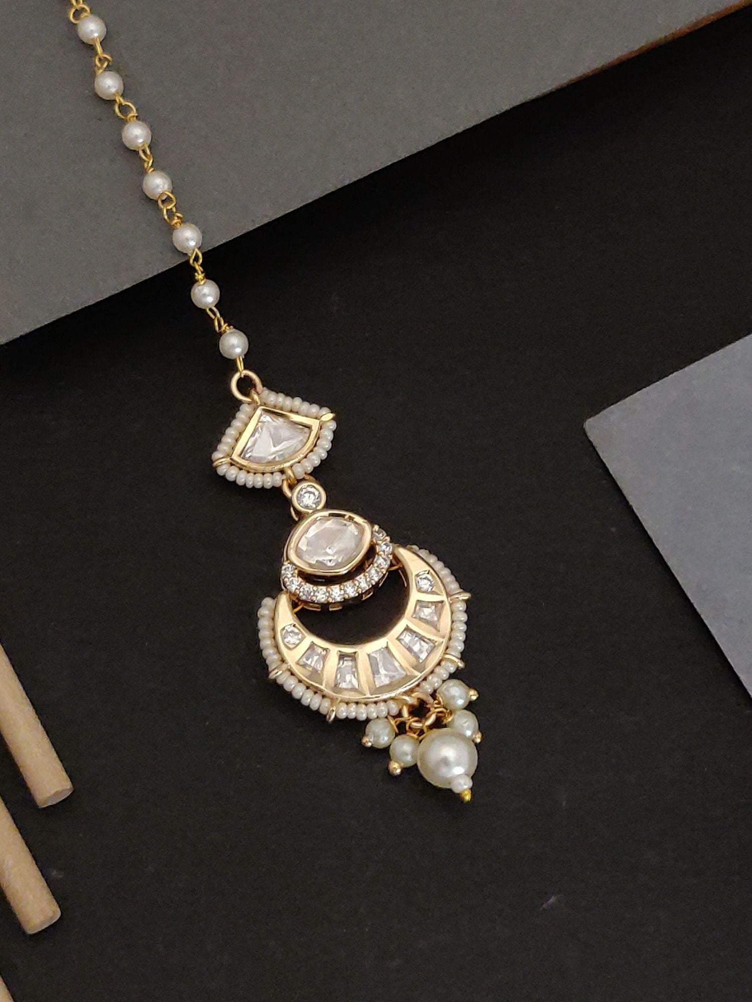 fashion Polki Kundan maangtikka for women with pearl chain and intricate gold detailing