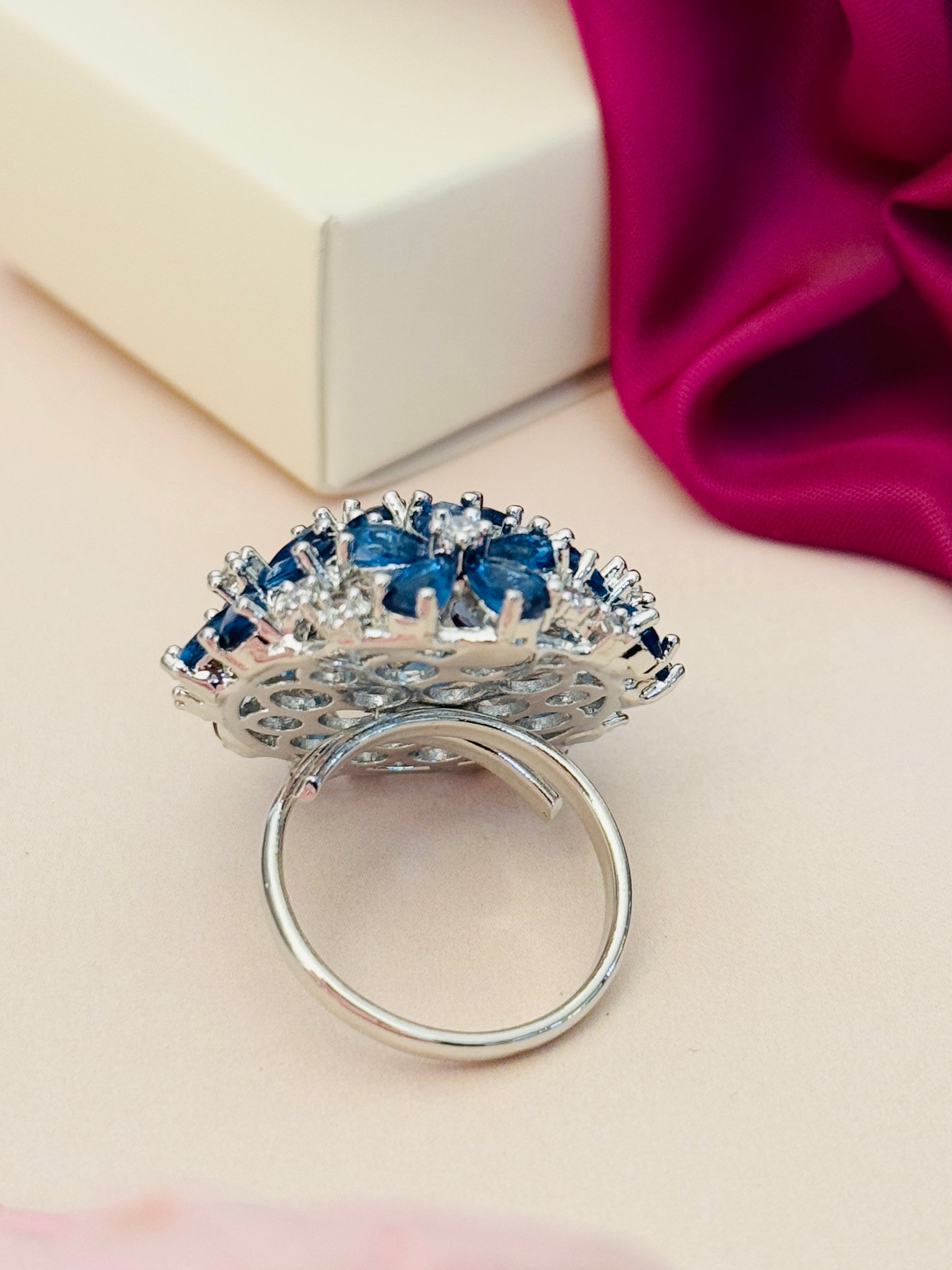 Floral Silver Plated Zircon Cocktail Party Ring with blue and clear stones on a silver band