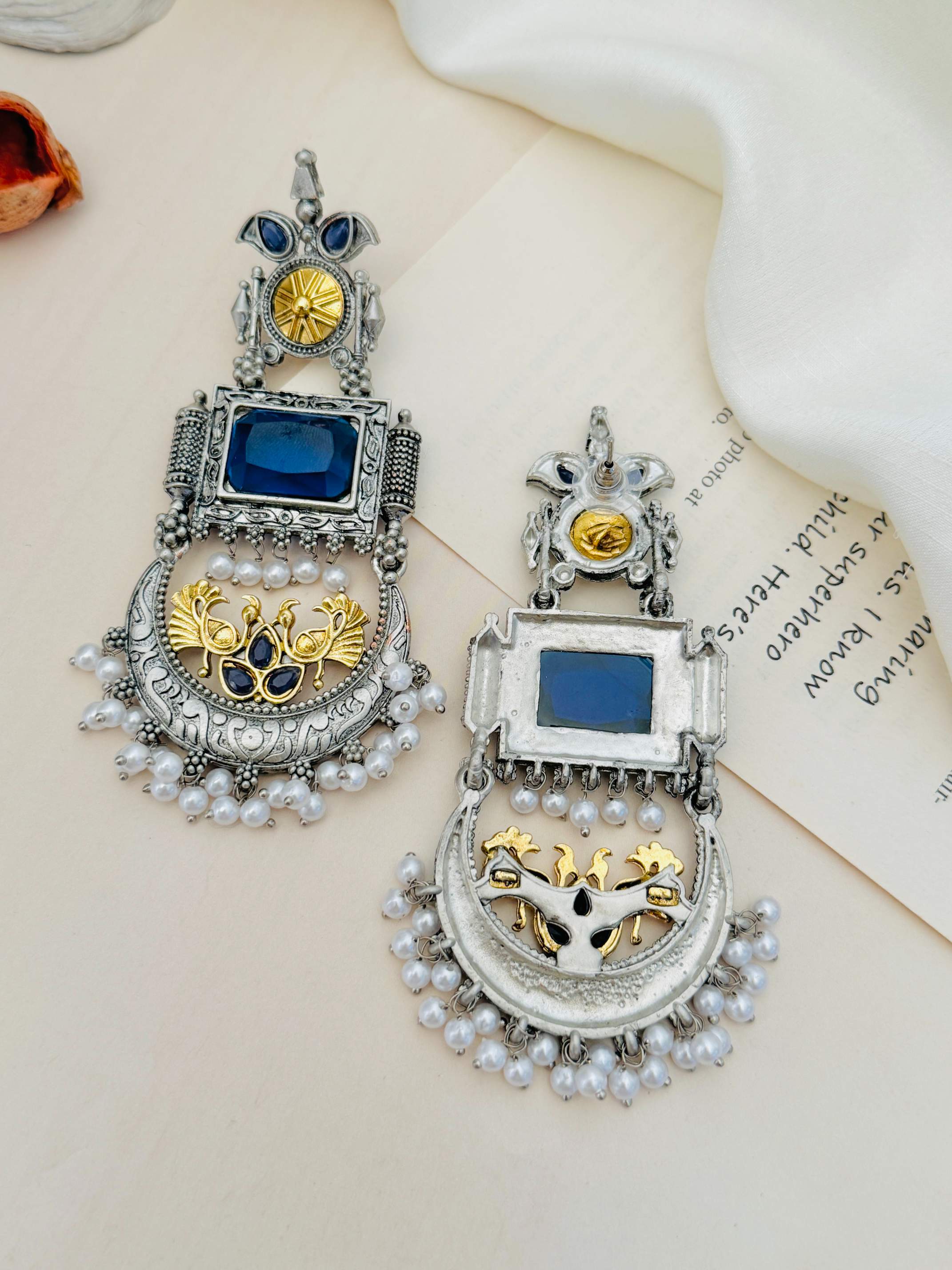 German Silver Dual Tone Peacock Earrings by Abdesignsjewellery with blue stones and pearl accents