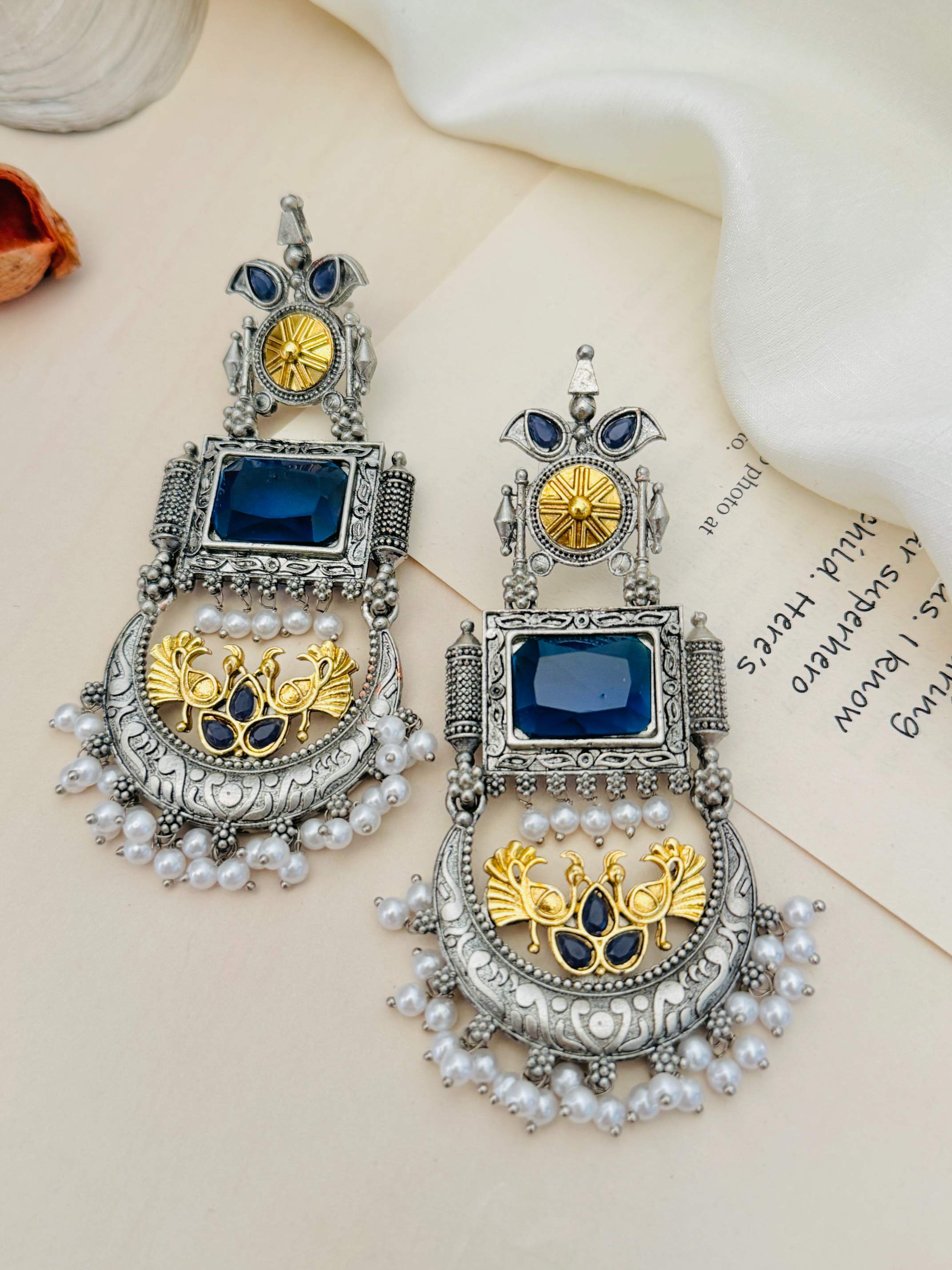 Abdesignsjewellery German Silver Dual Tone Peacock Earrings with blue stones and pearl detailing