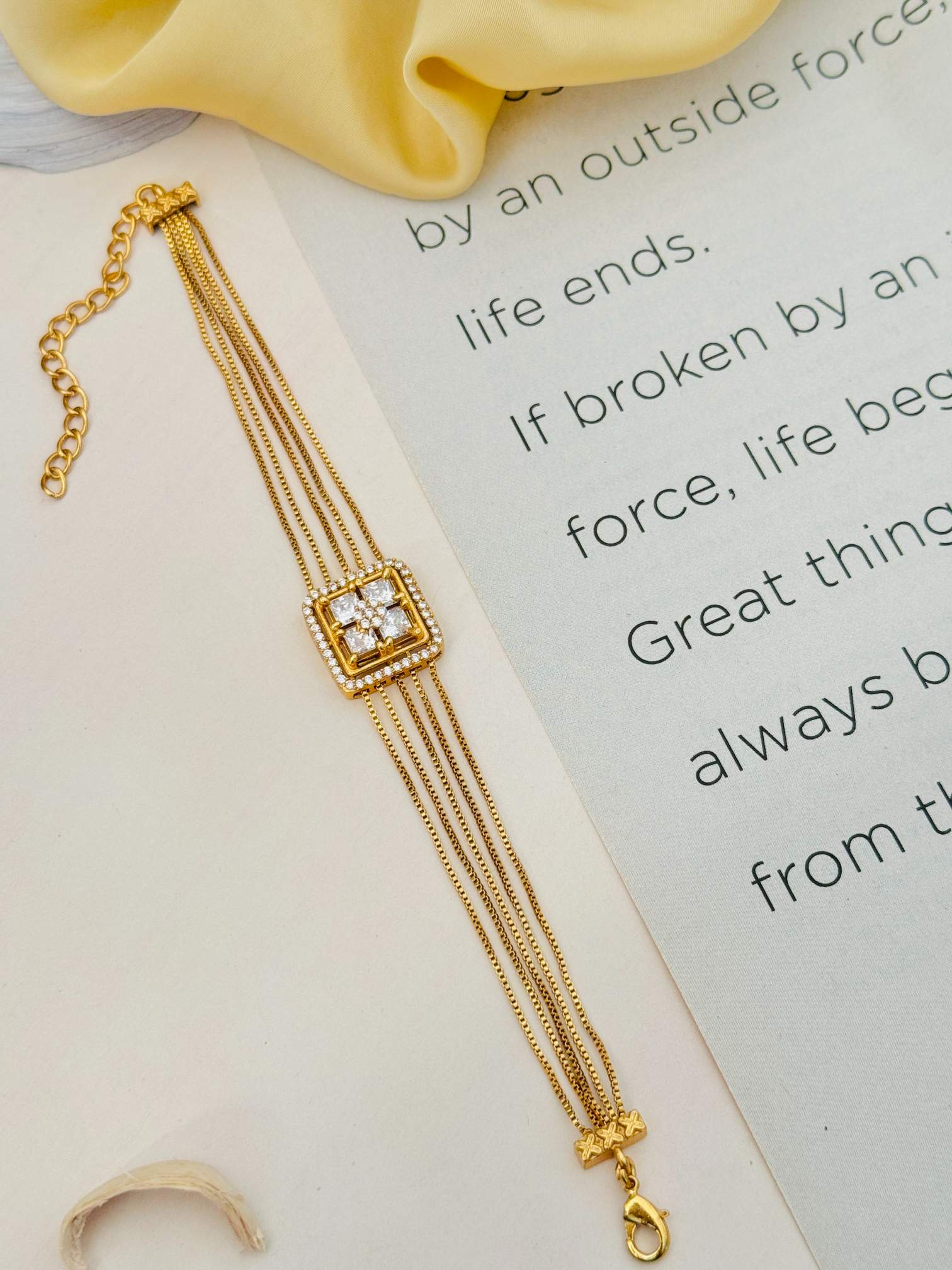 Gold Plated American Diamond Hand Bracelet by Abdesignsjewellery with square centerpiece and delicate chain design