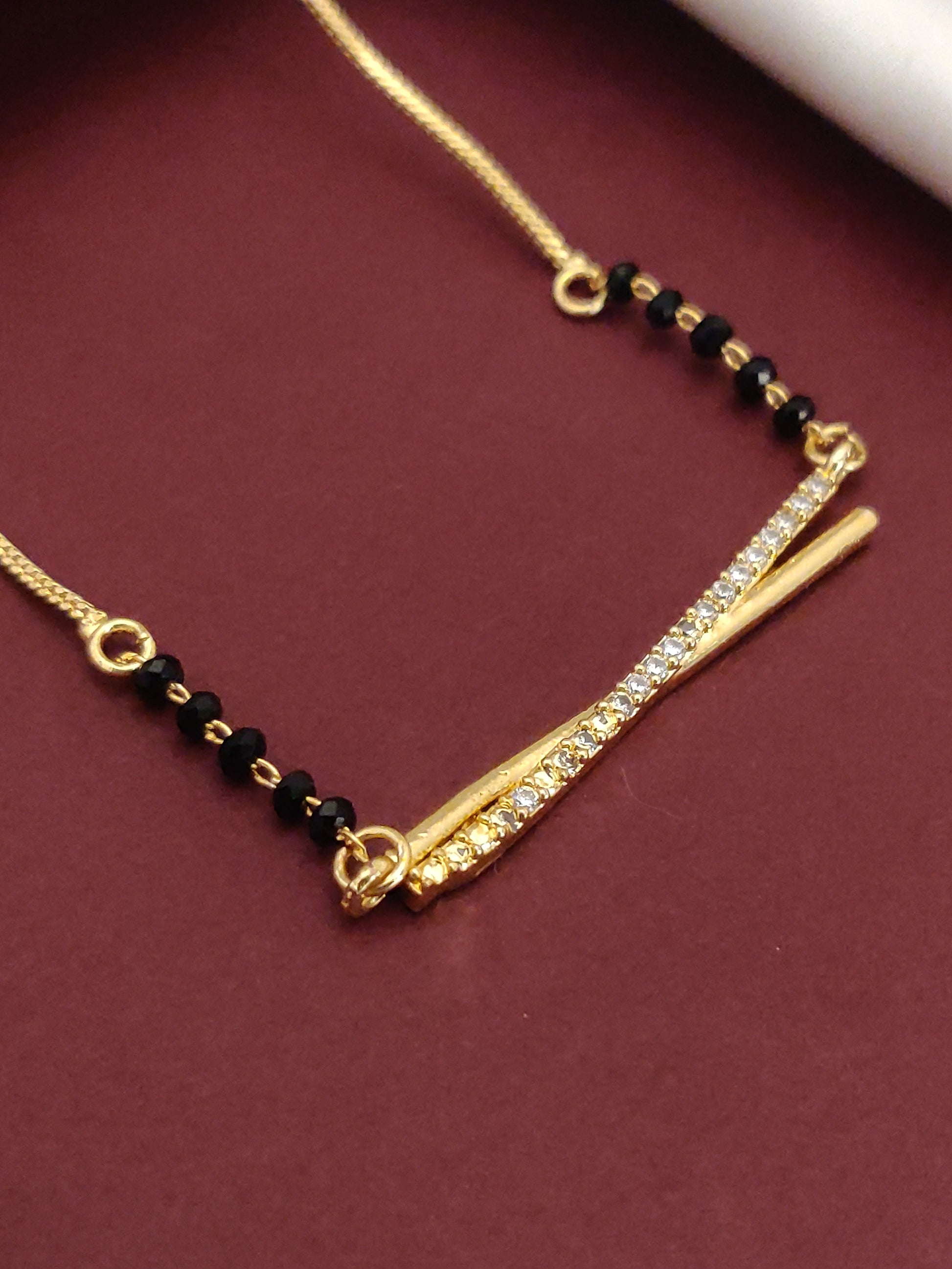 Gold Plated American Diamond Mangalsutra with elegant design and black beads
