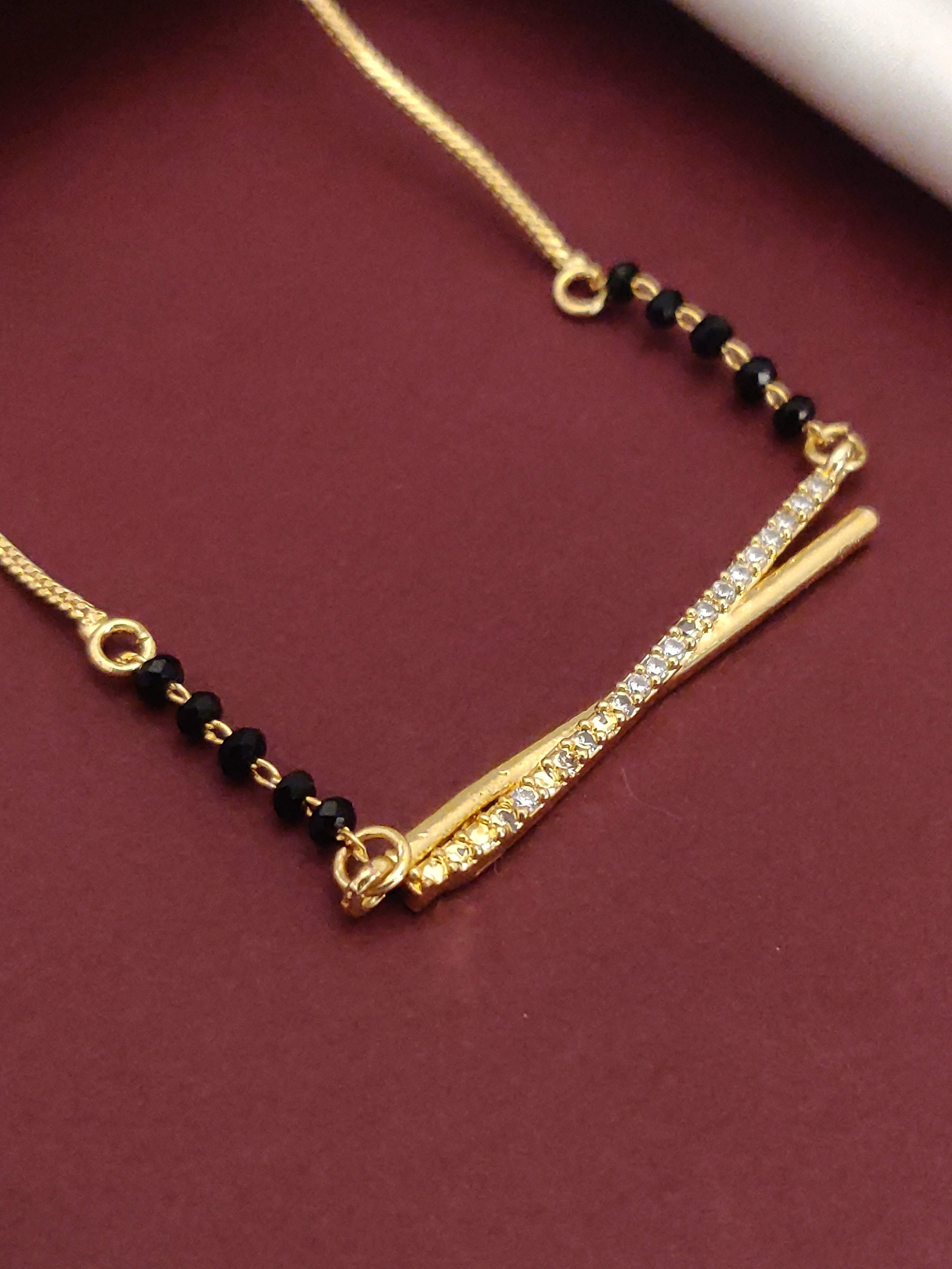 Gold Plated American Diamond Mangalsutra with elegant design and black beads