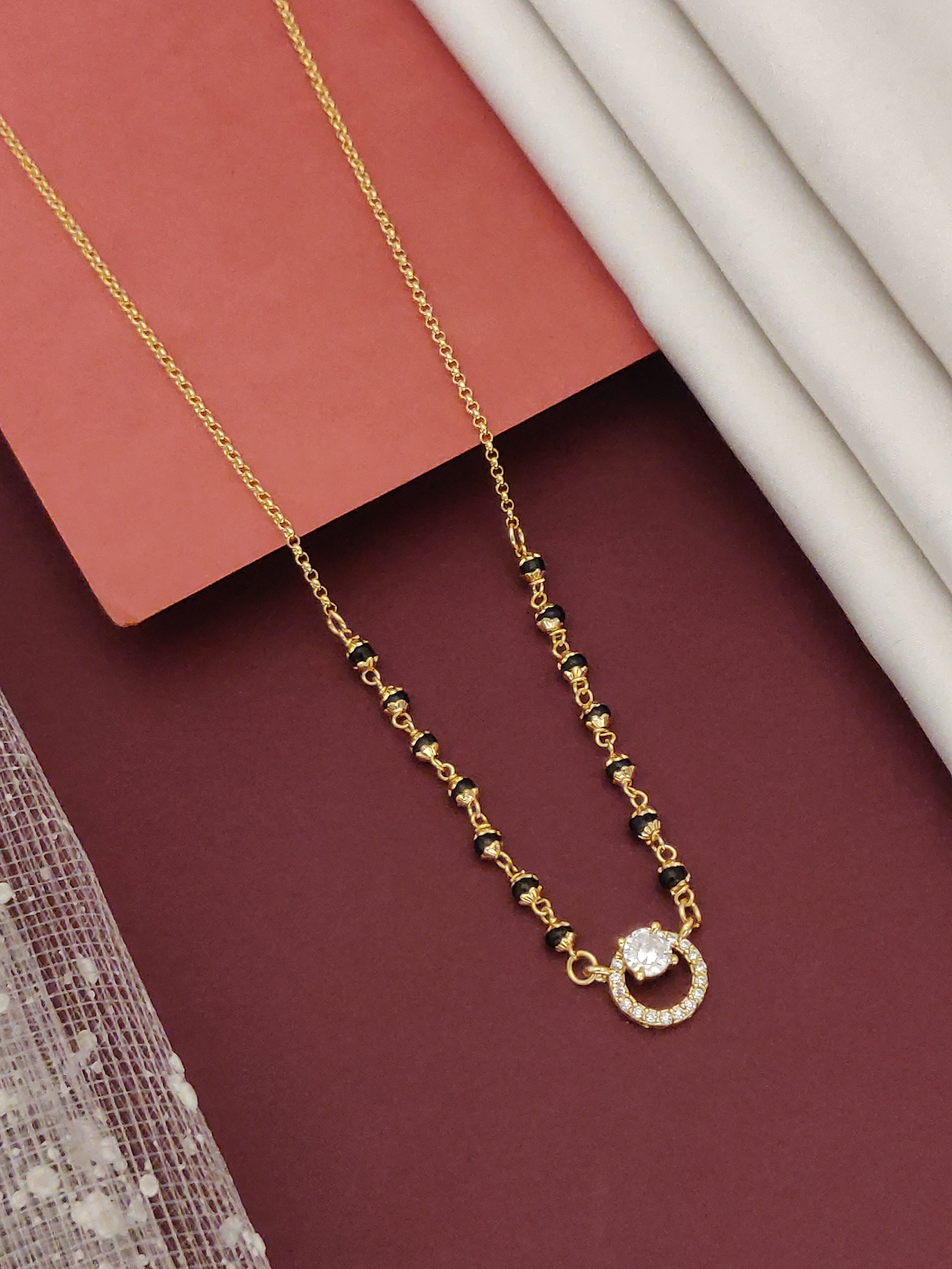 Gold Plated American Diamond Mangalsutra with a stylish design for modern weddings