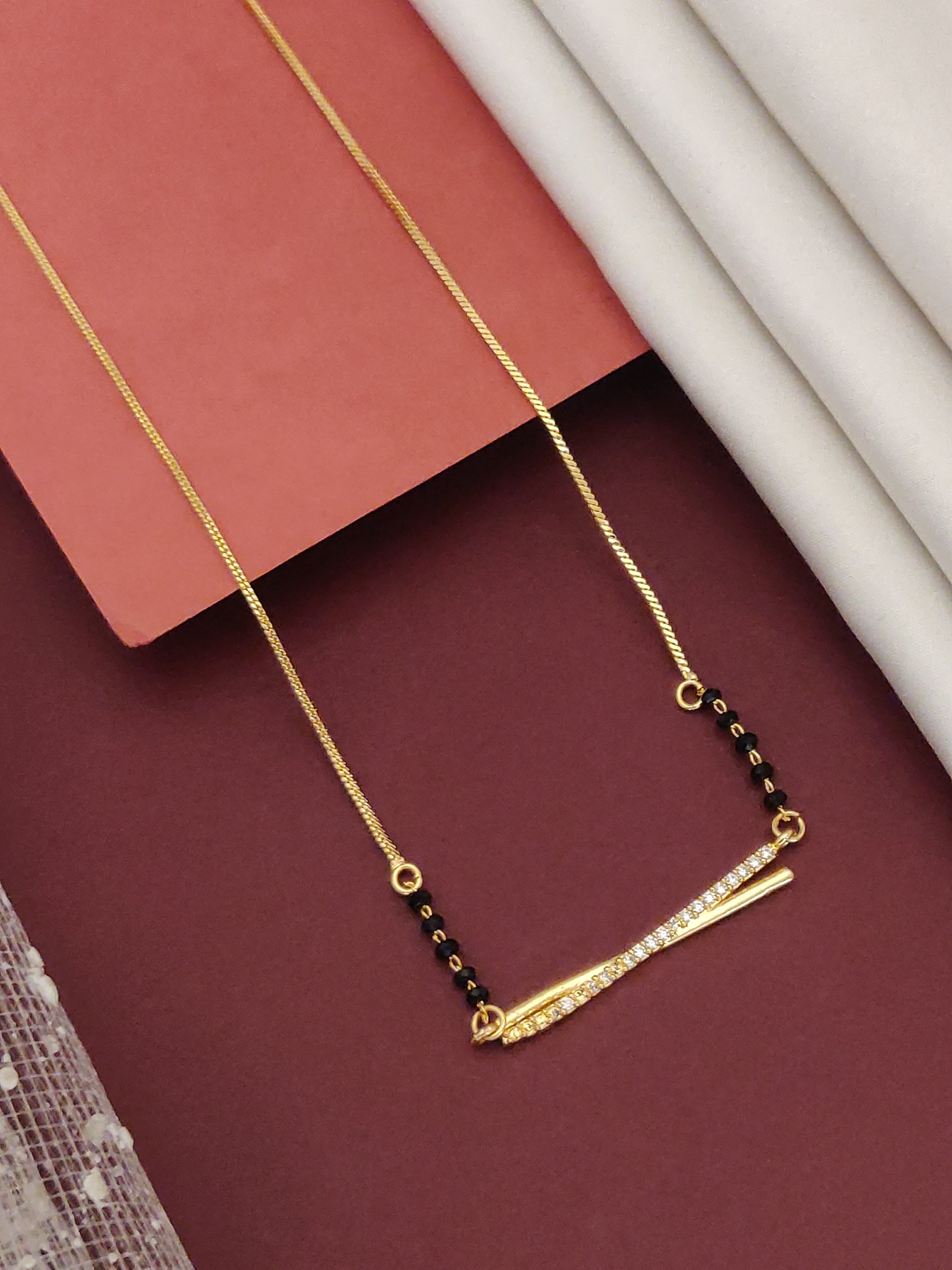 Elegant Gold Plated American Diamond Mangalsutra with Black Beads and Stylish Design