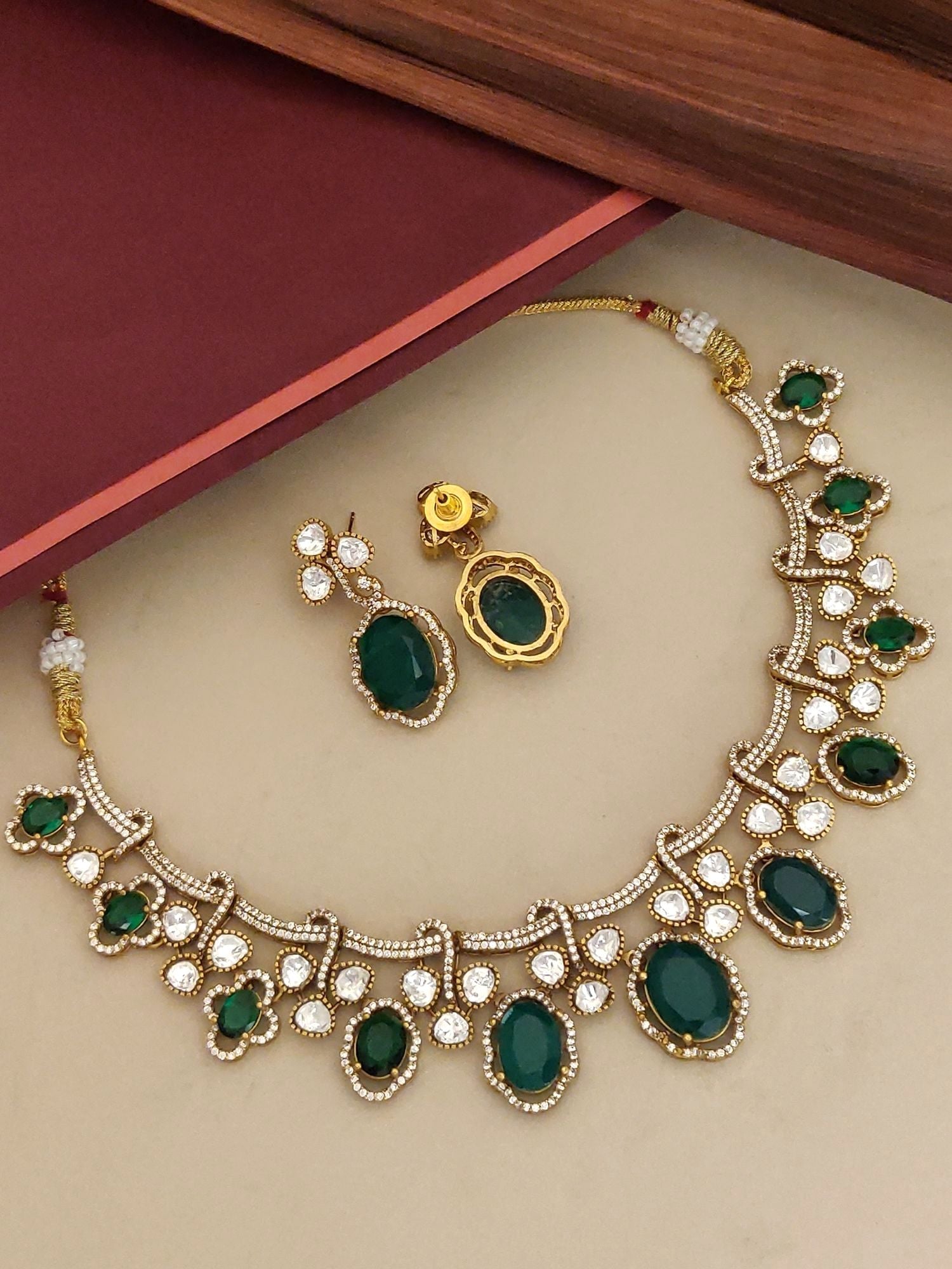 Elegant Gold Plated American Diamond Necklace Set with Green Gemstones and Matching Earrings