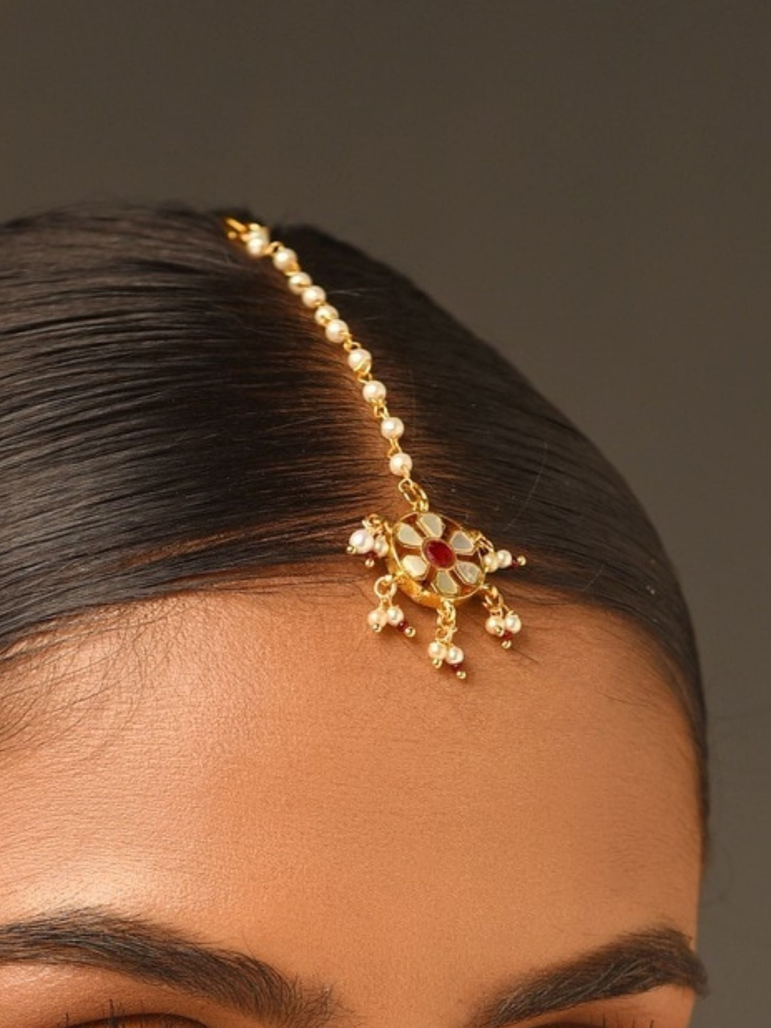 Gold Plated Colourful Paachi Kundan Maangtikka worn on center parting of hair from Abdesignsjewellery